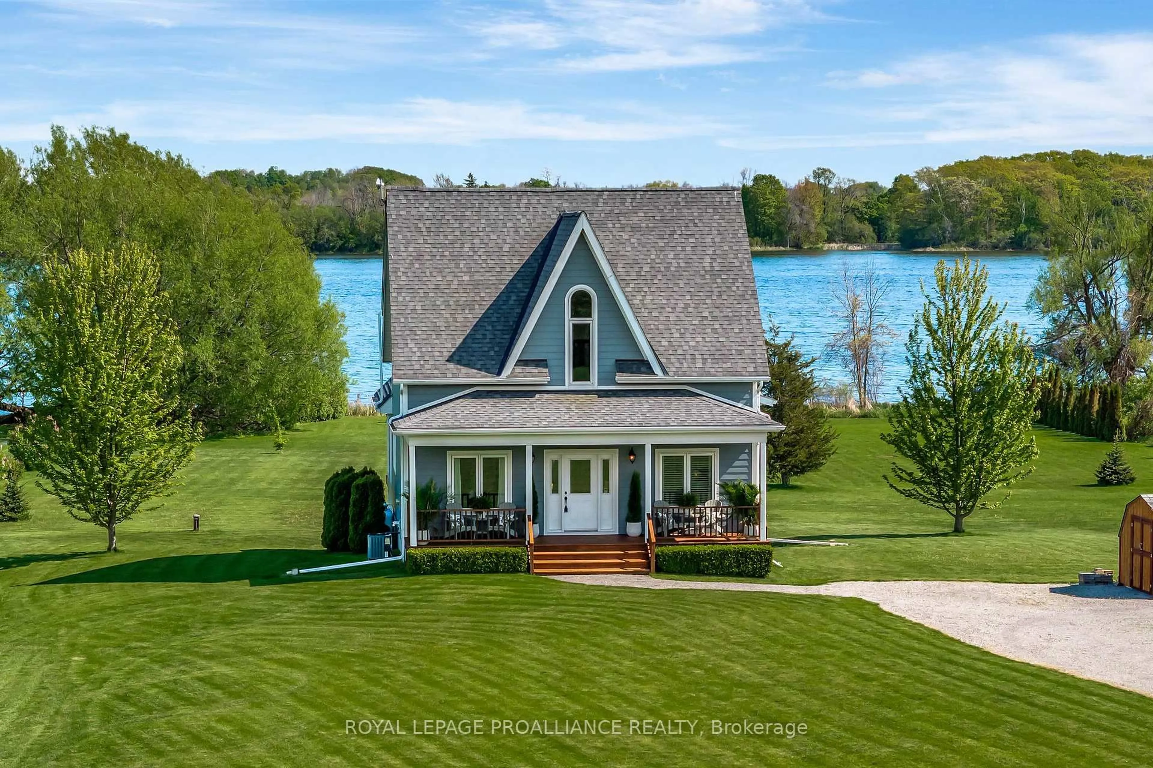 A pic from outside/outdoor area/front of a property/back of a property/a pic from drone, water/lake/river/ocean view for 19337 Loyalist Pkwy, Prince Edward County Ontario K0K 2J0