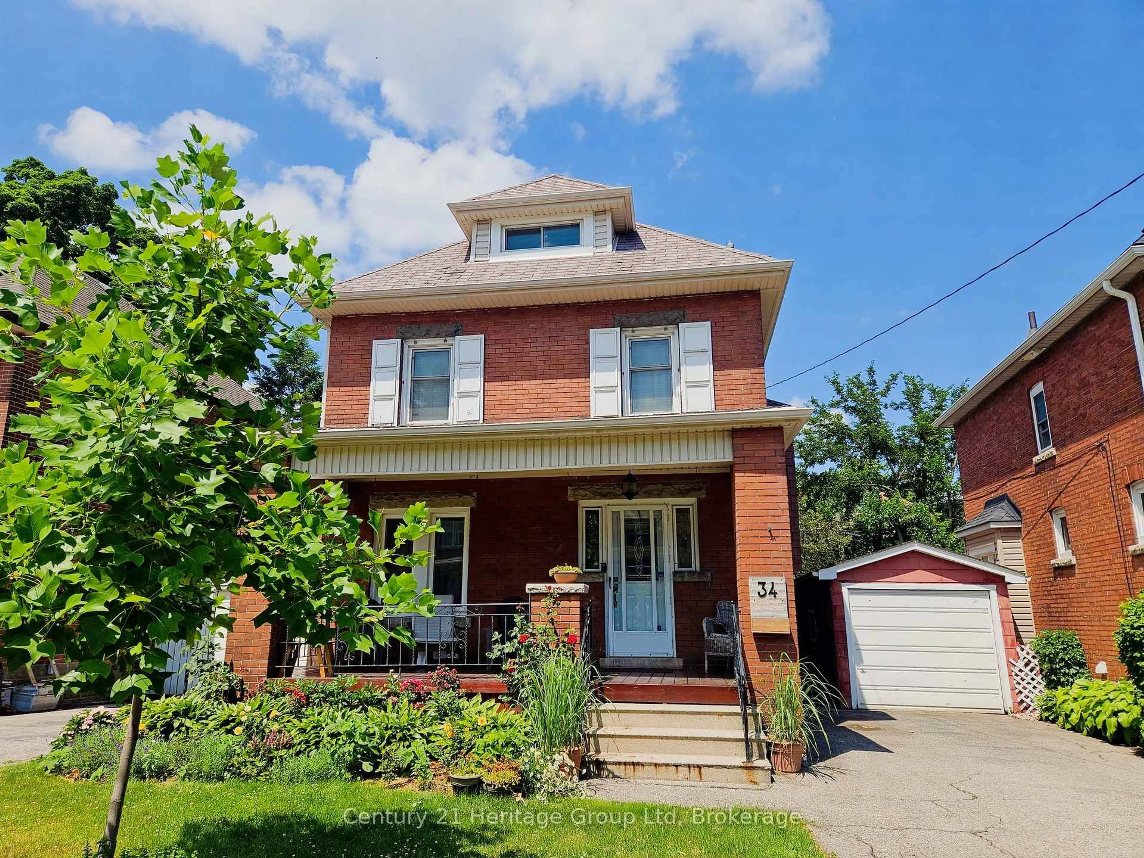 Home with brick exterior material, street for 34 Connaught Ave, Hamilton Ontario L8M 3C2