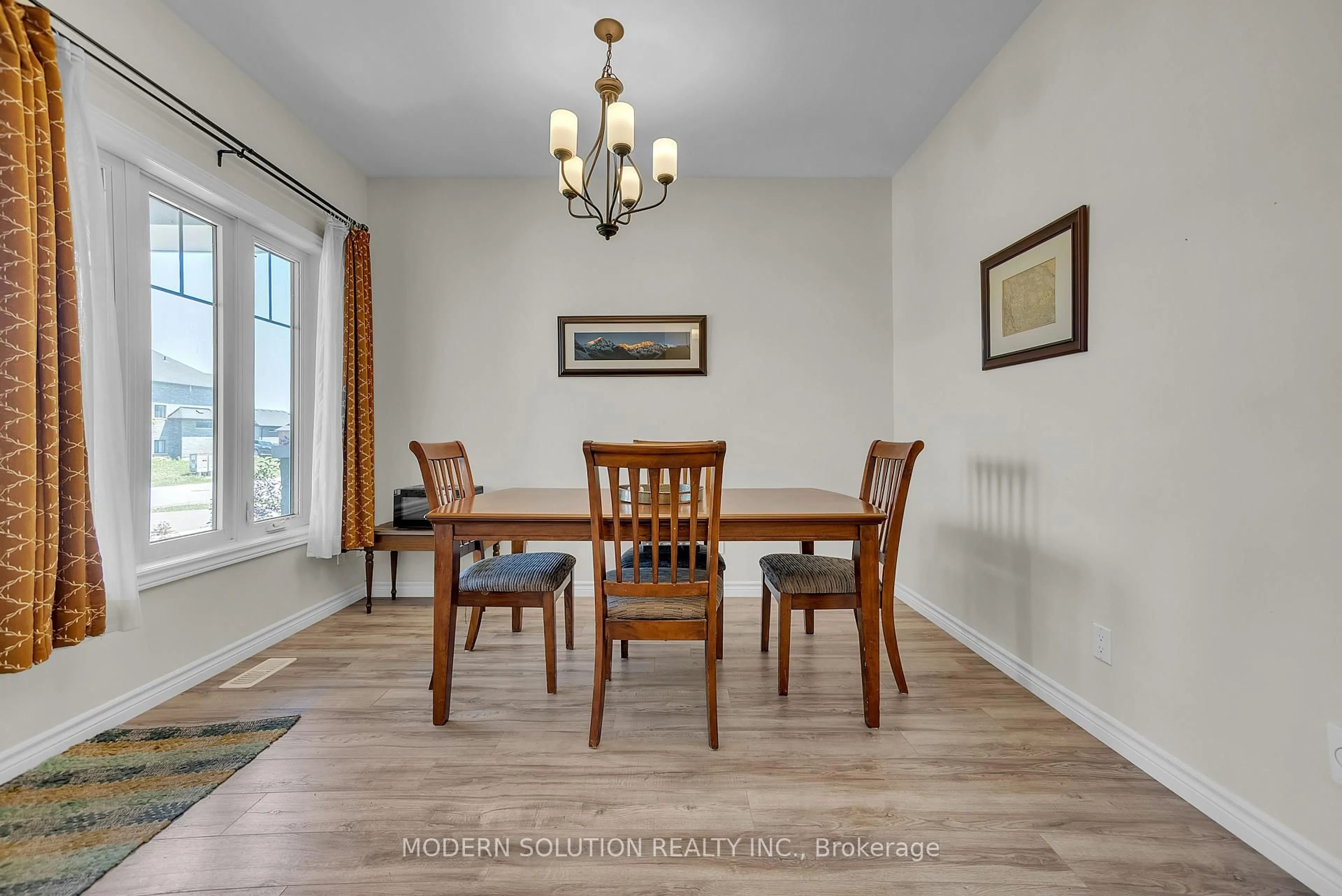 Dining room, wood/laminate floor for 12 Cypress Dr, Belleville Ontario K8N 0J6