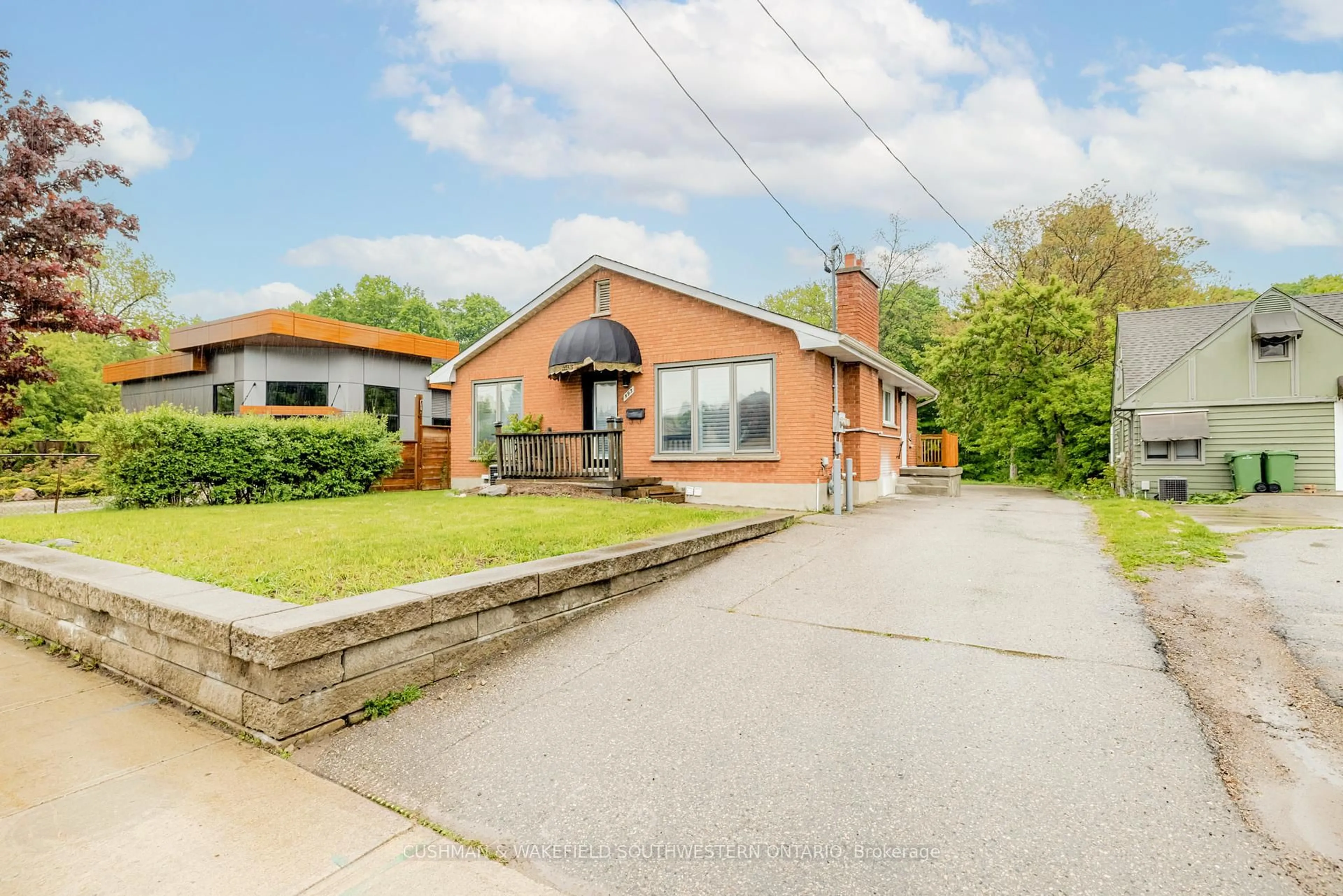 Home with brick exterior material, street for 593 Wonderland Rd, London North Ontario N6H 3E2