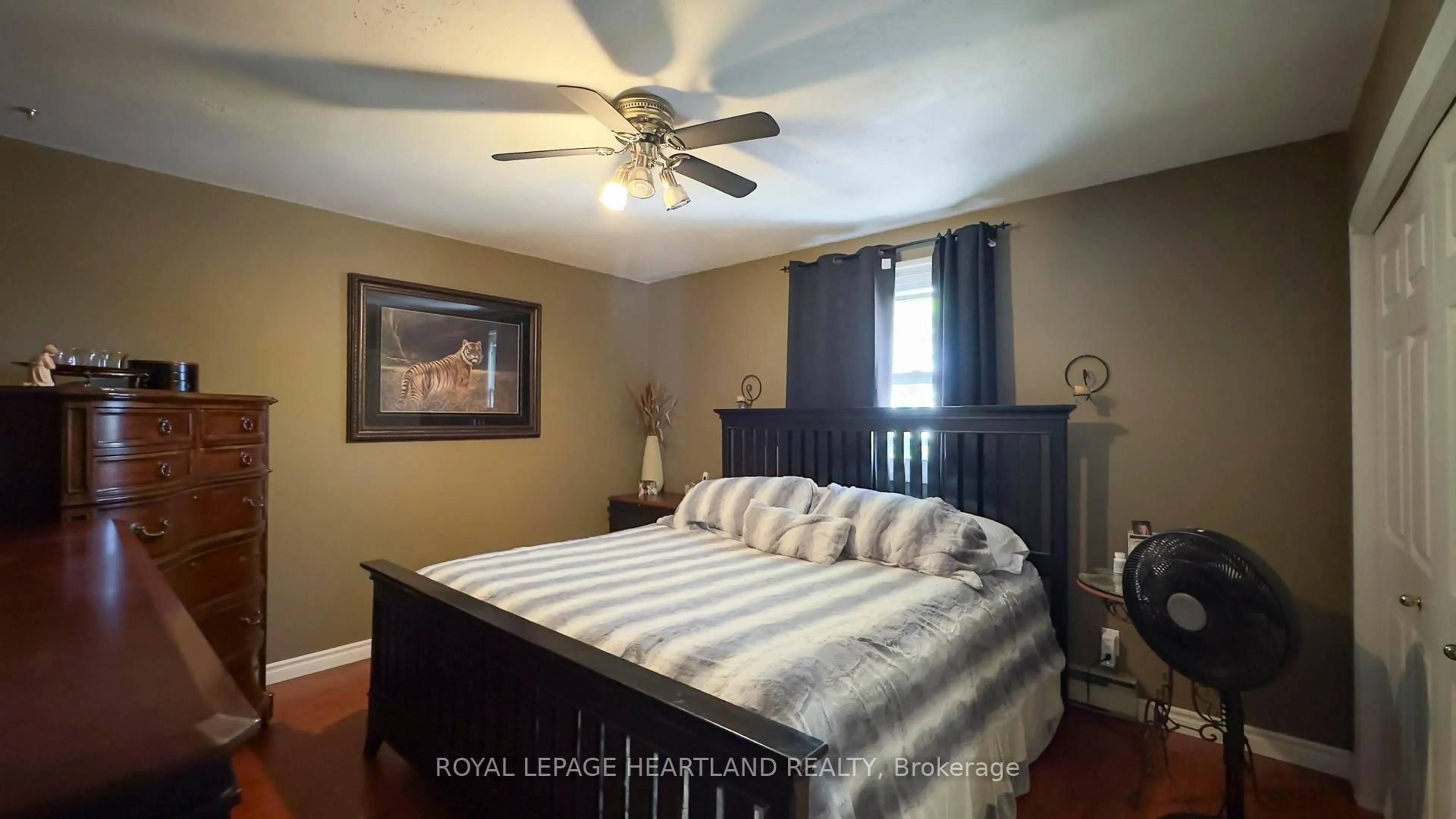Bedroom with bed, wood/laminate floor for 167 Dashwood Rd, South Huron Ontario N0M 1N0