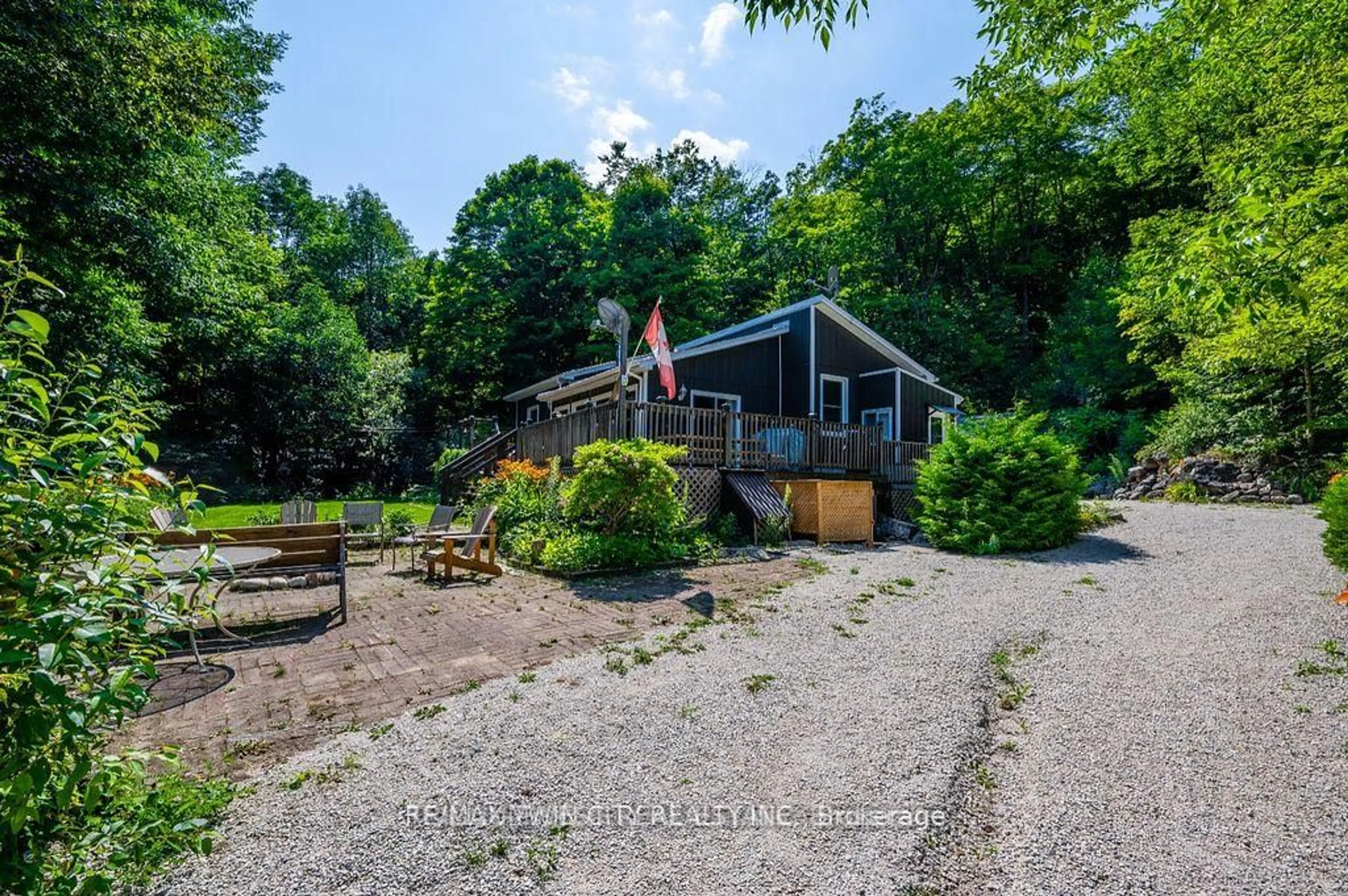 A pic from outside/outdoor area/front of a property/back of a property/a pic from drone, unknown for 11 14th Ave, South Bruce Peninsula Ontario N0H 2T0