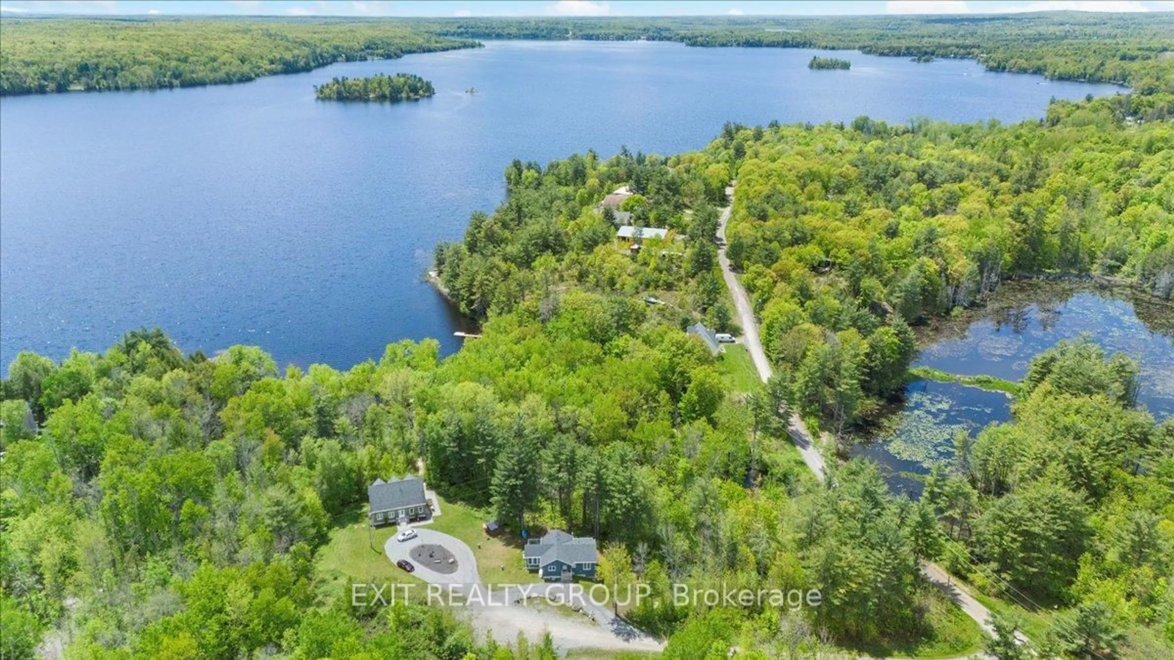 A pic from outside/outdoor area/front of a property/back of a property/a pic from drone, water/lake/river/ocean view for 3 Quail Ridge Lane, Tweed Ontario K0K 3J0