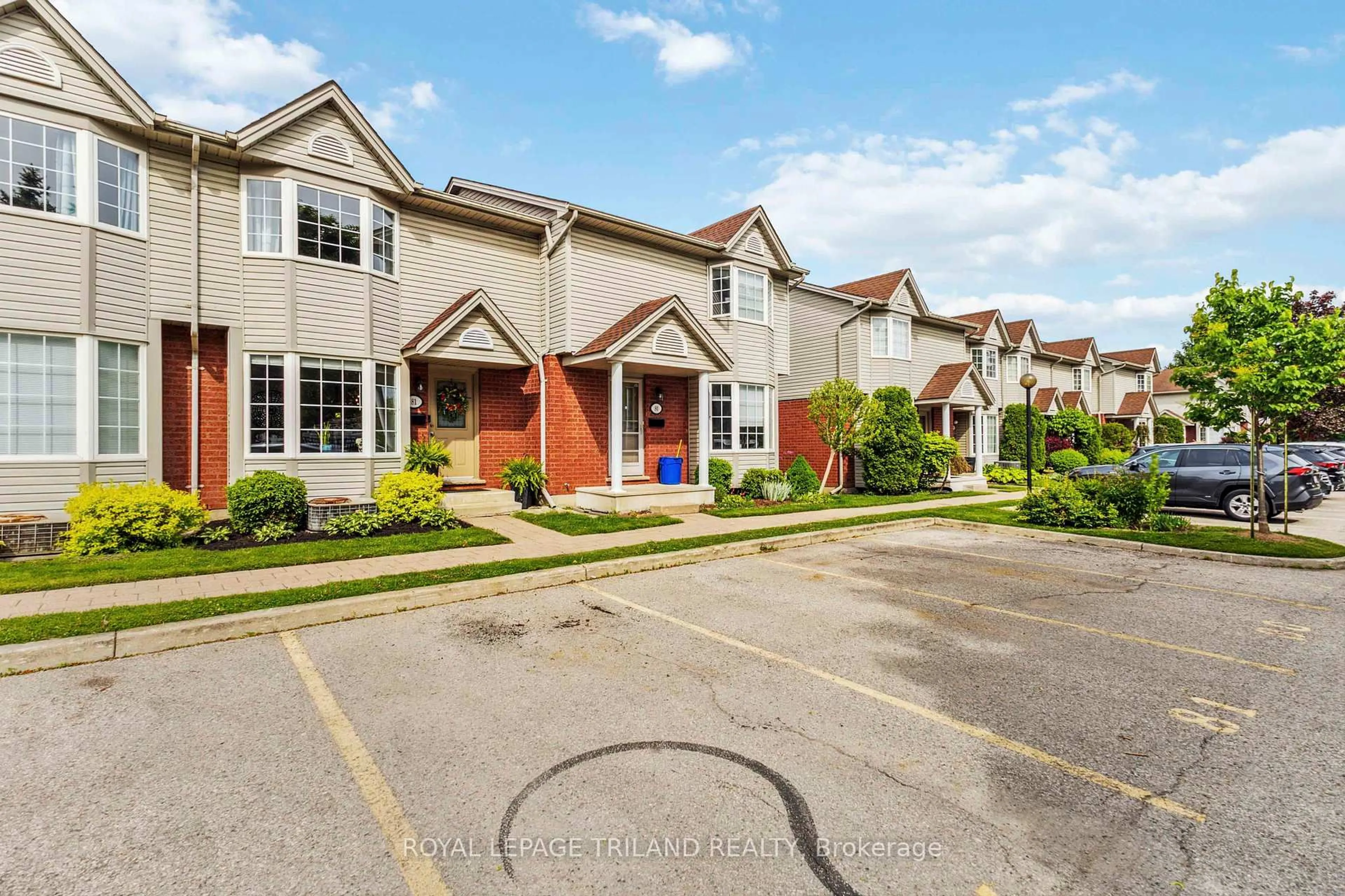 A pic from outside/outdoor area/front of a property/back of a property/a pic from drone, street for 101 Brookside St #81, London South Ontario N5Z 5C9