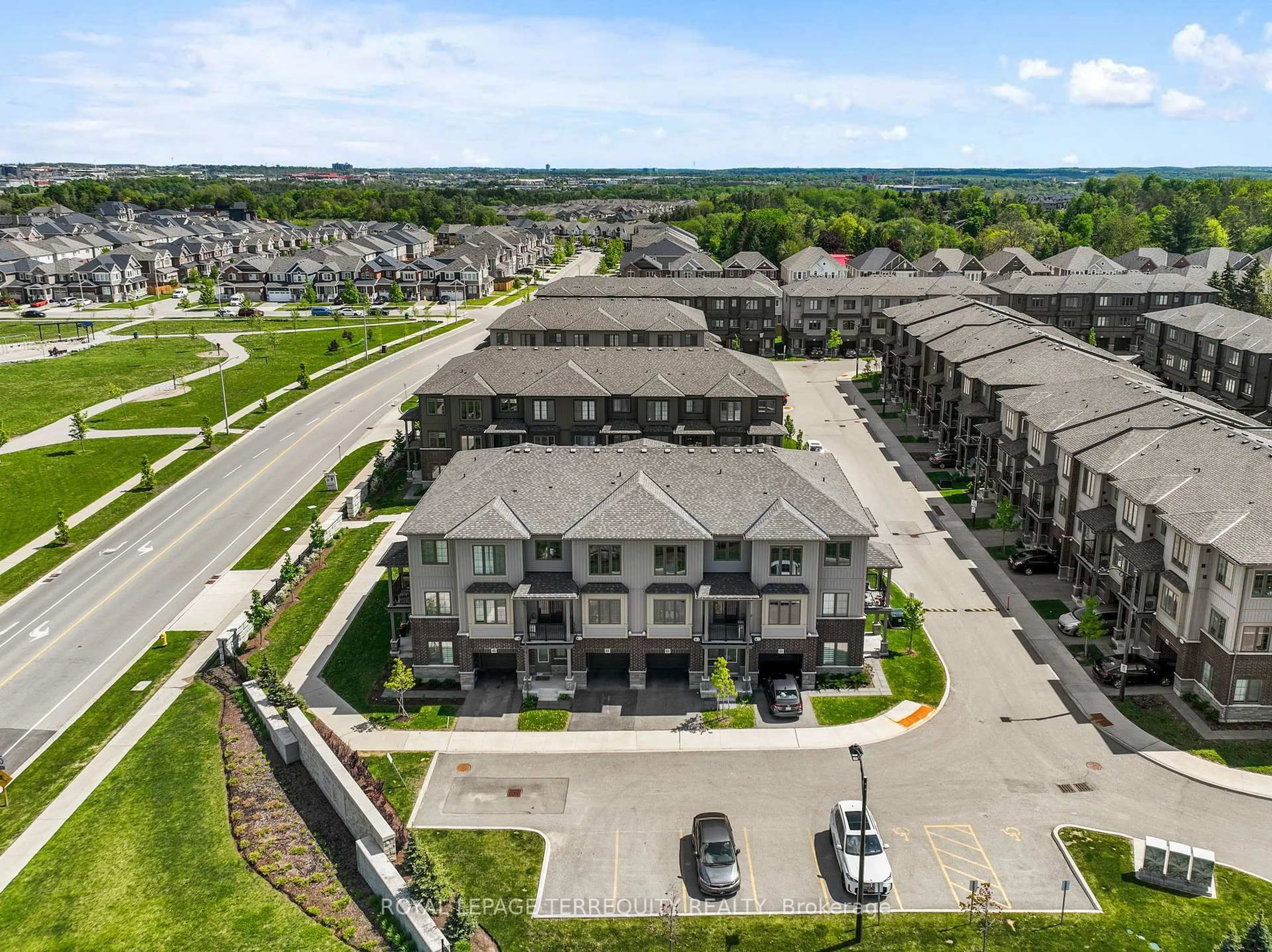 A pic from outside/outdoor area/front of a property/back of a property/a pic from drone, mountain view for 124 Compass Tr #64, Cambridge Ontario N3E 0E3