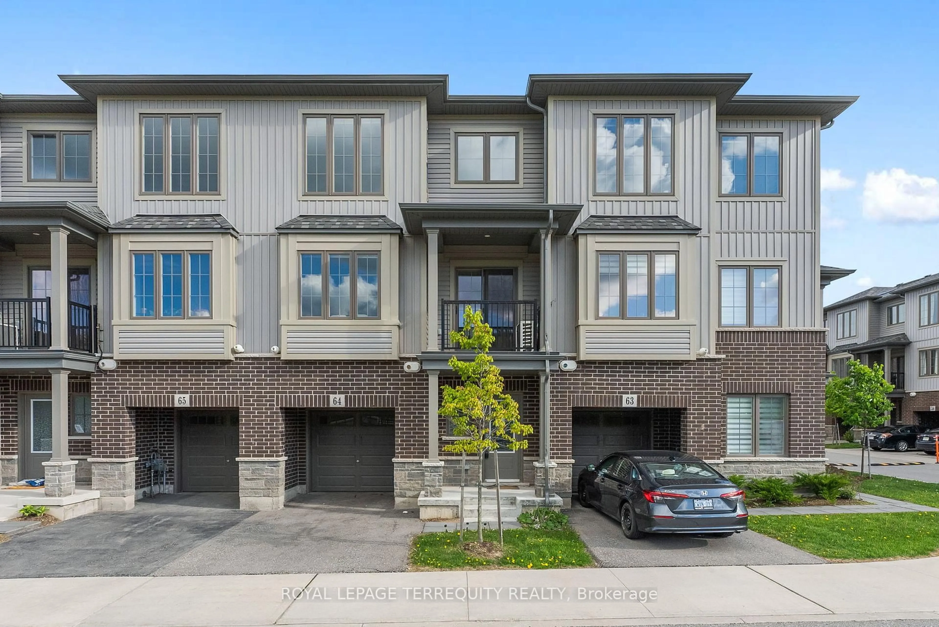 Home with brick exterior material, street for 124 Compass Tr #64, Cambridge Ontario N3E 0E3