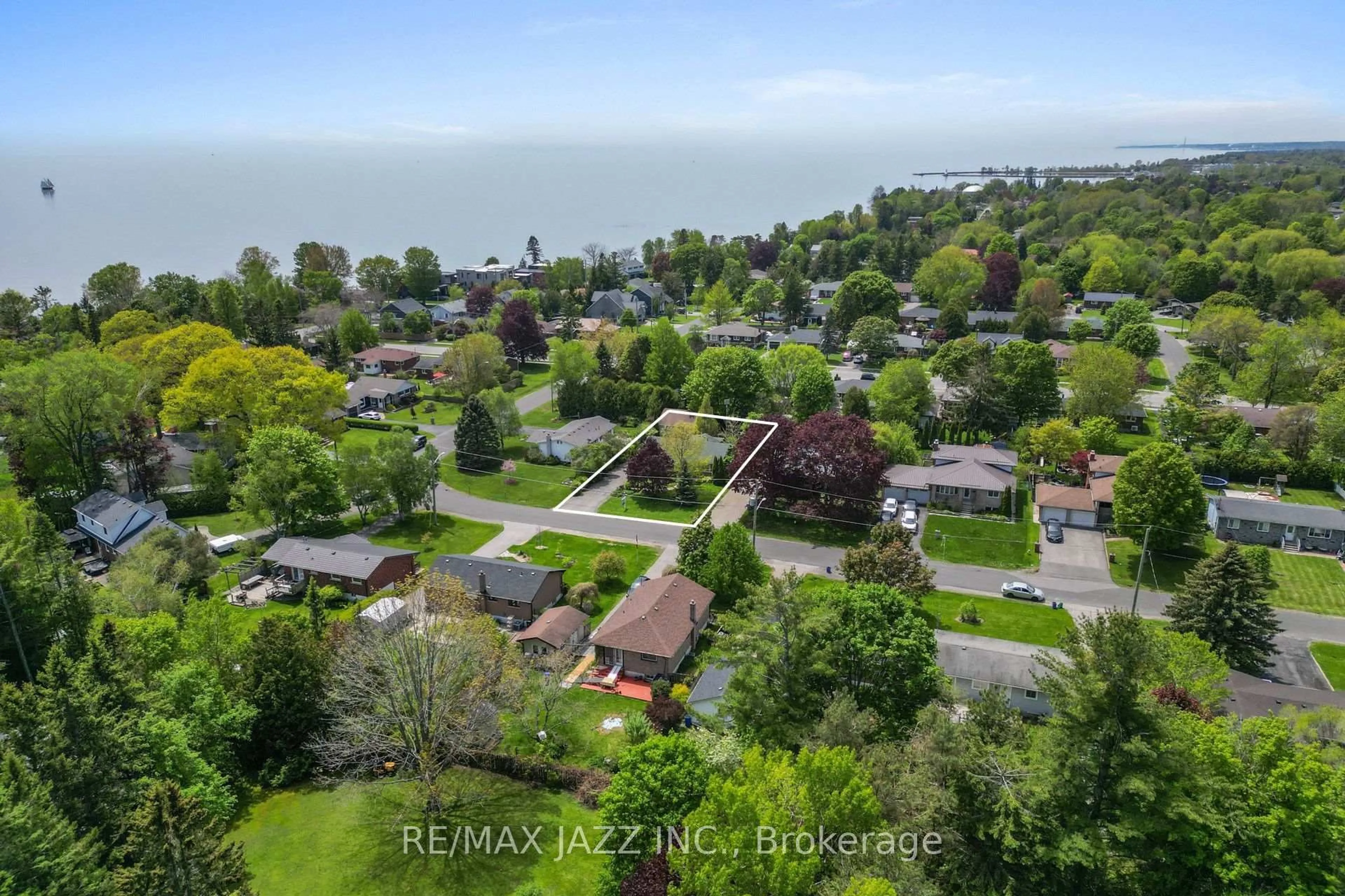 A pic from outside/outdoor area/front of a property/back of a property/a pic from drone, water/lake/river/ocean view for 13 Springbrook Rd, Cobourg Ontario K9A 4H8
