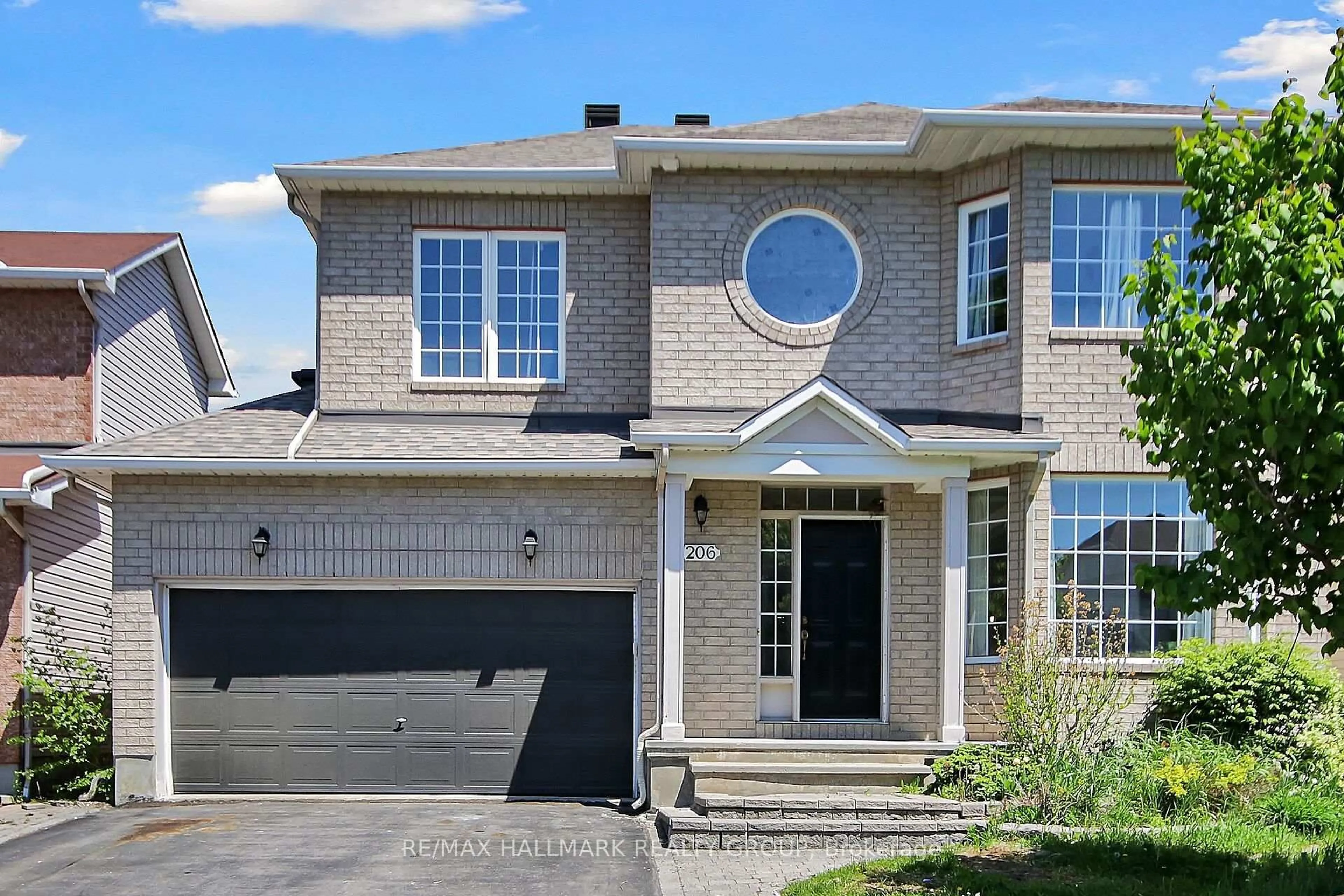 Home with brick exterior material, street for 206 Annapolis Circ, Ottawa Ontario K1V 1Y9