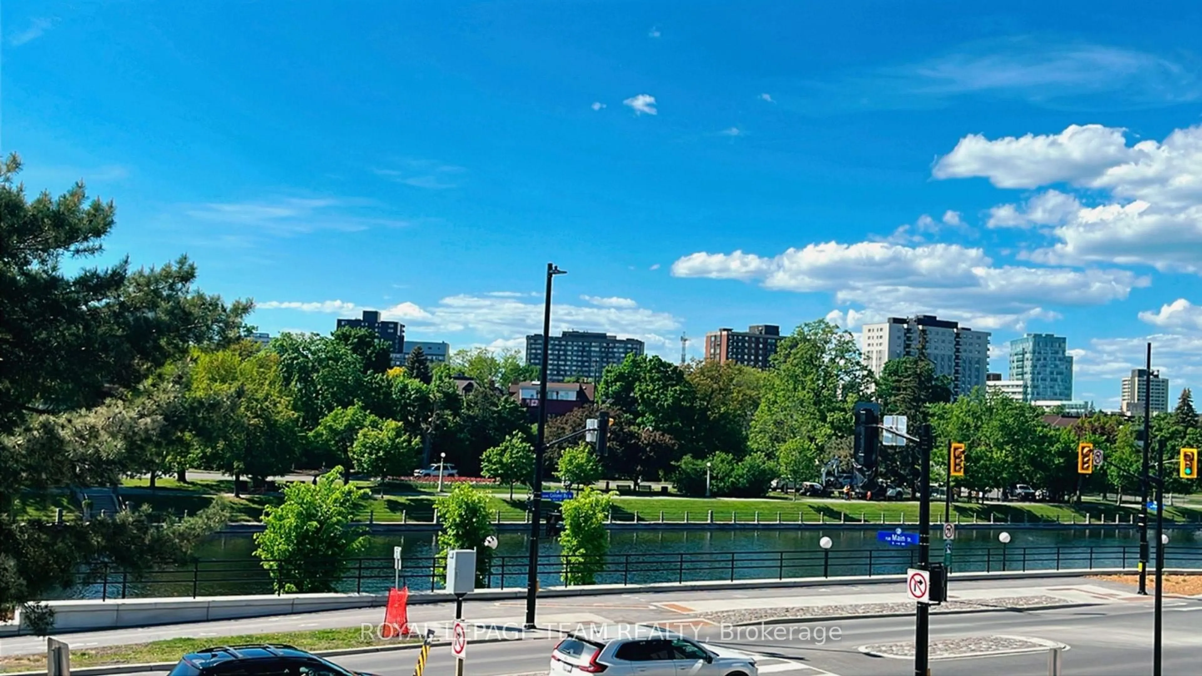 A pic from outside/outdoor area/front of a property/back of a property/a pic from drone, water/lake/river/ocean view for 10 Main St #203, Ottawa Ontario K1S 1M9
