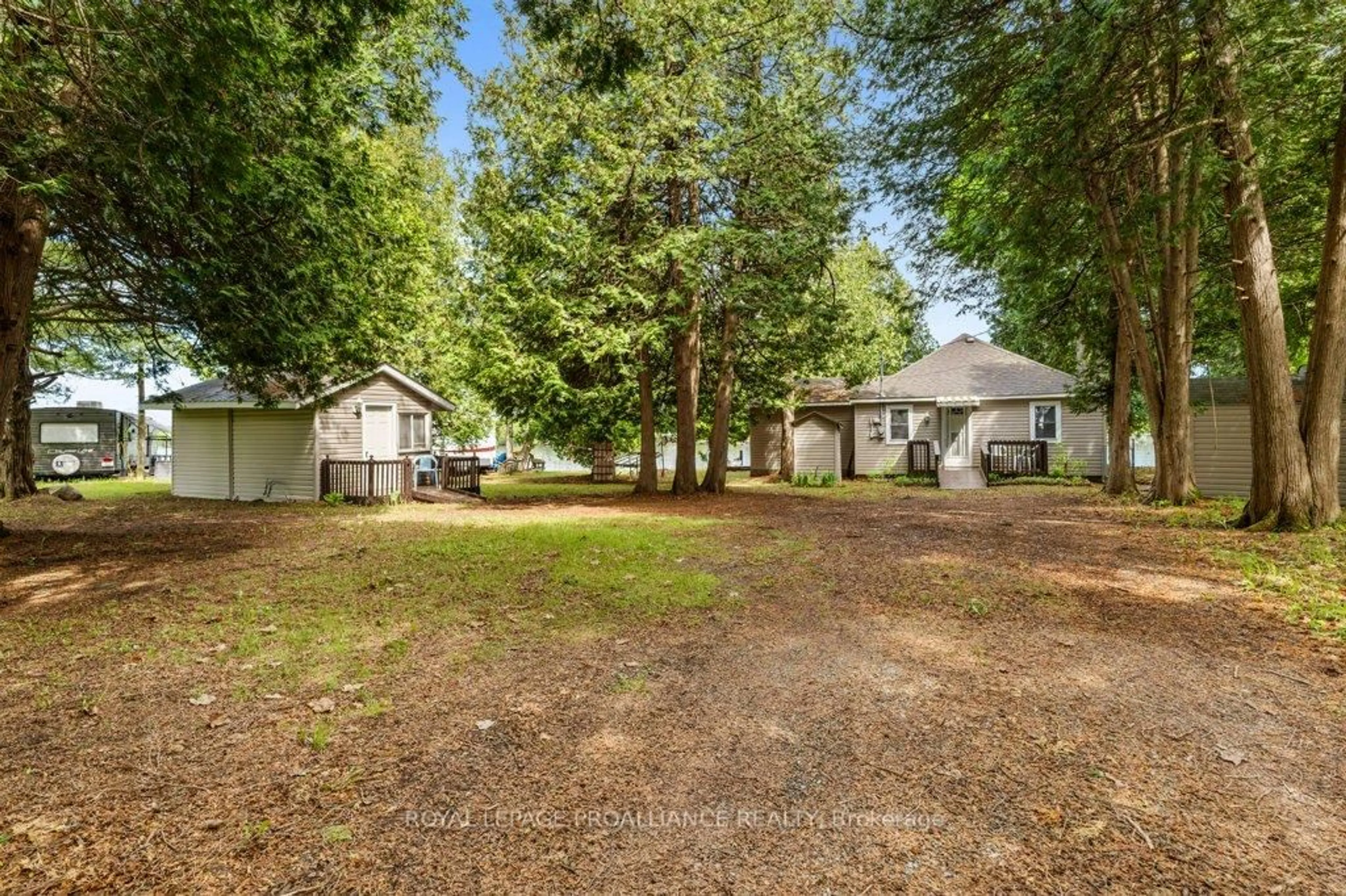 A pic from outside/outdoor area/front of a property/back of a property/a pic from drone, forest/trees view for 188 North Beaver Lake Rd, Stone Mills Ontario K0K 2A0