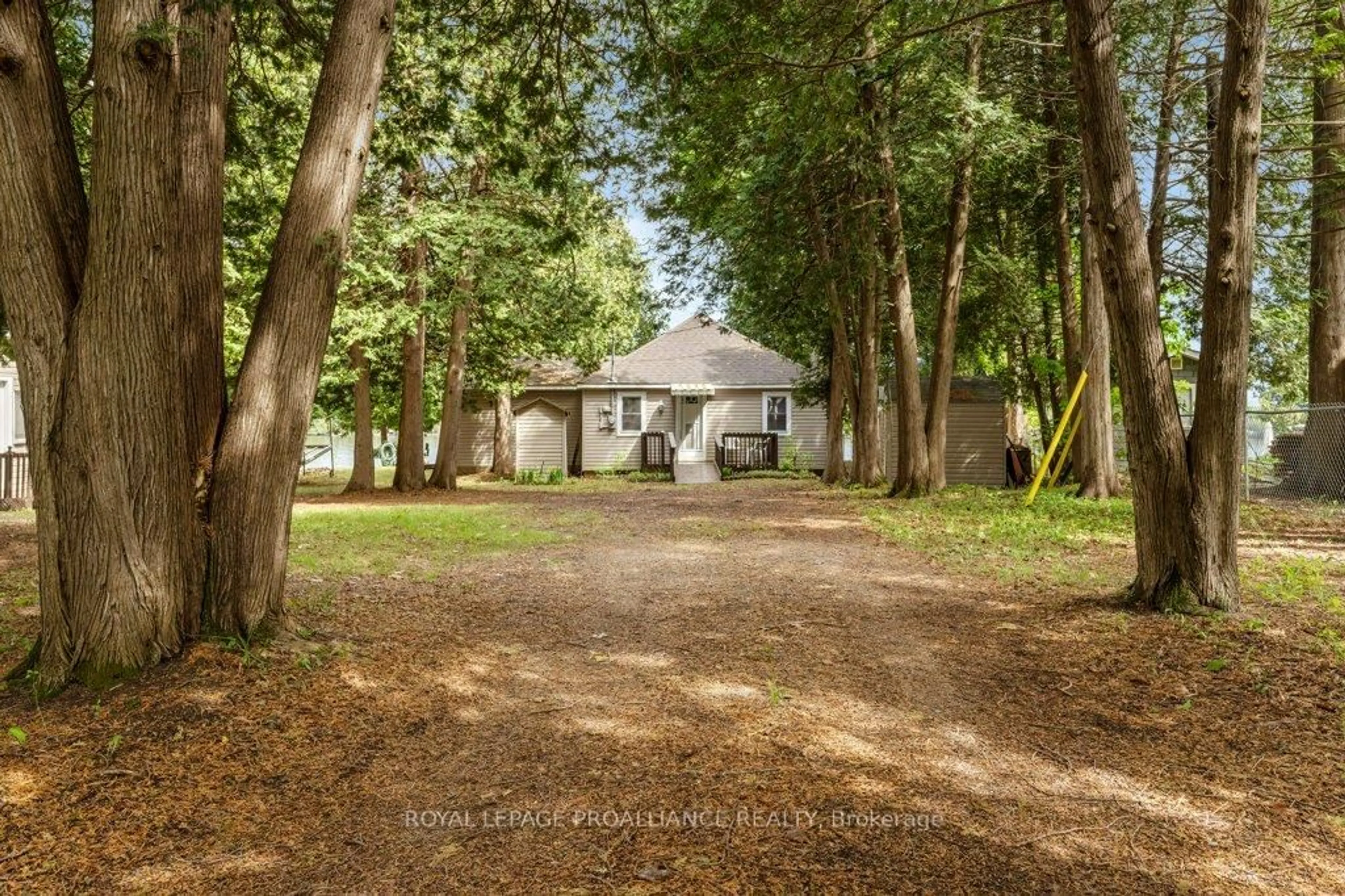 A pic from outside/outdoor area/front of a property/back of a property/a pic from drone, forest/trees view for 188 North Beaver Lake Rd, Stone Mills Ontario K0K 2A0