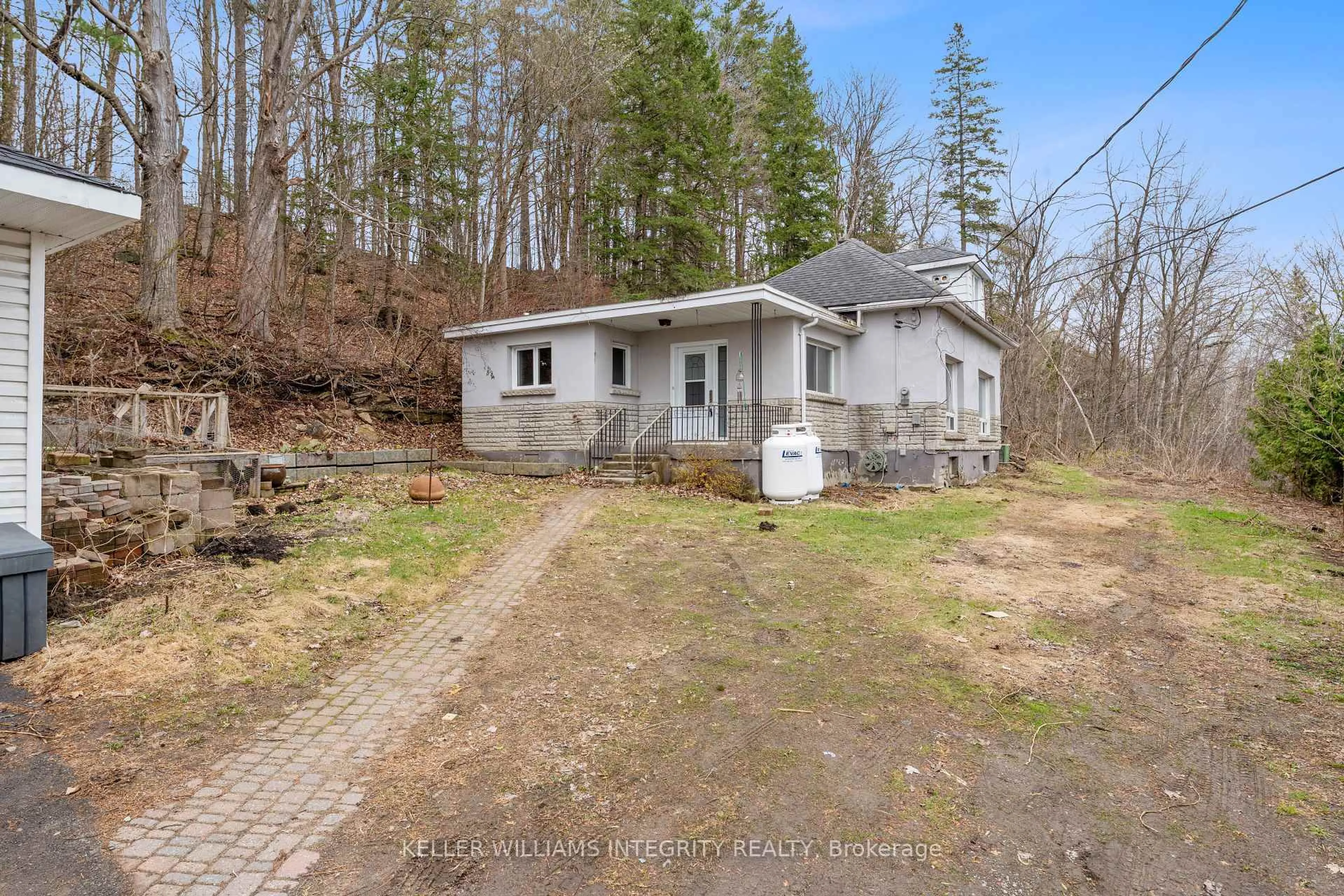 A pic from outside/outdoor area/front of a property/back of a property/a pic from drone, street for 3722 St Joseph Blvd, Ottawa Ontario K4A 0Z5