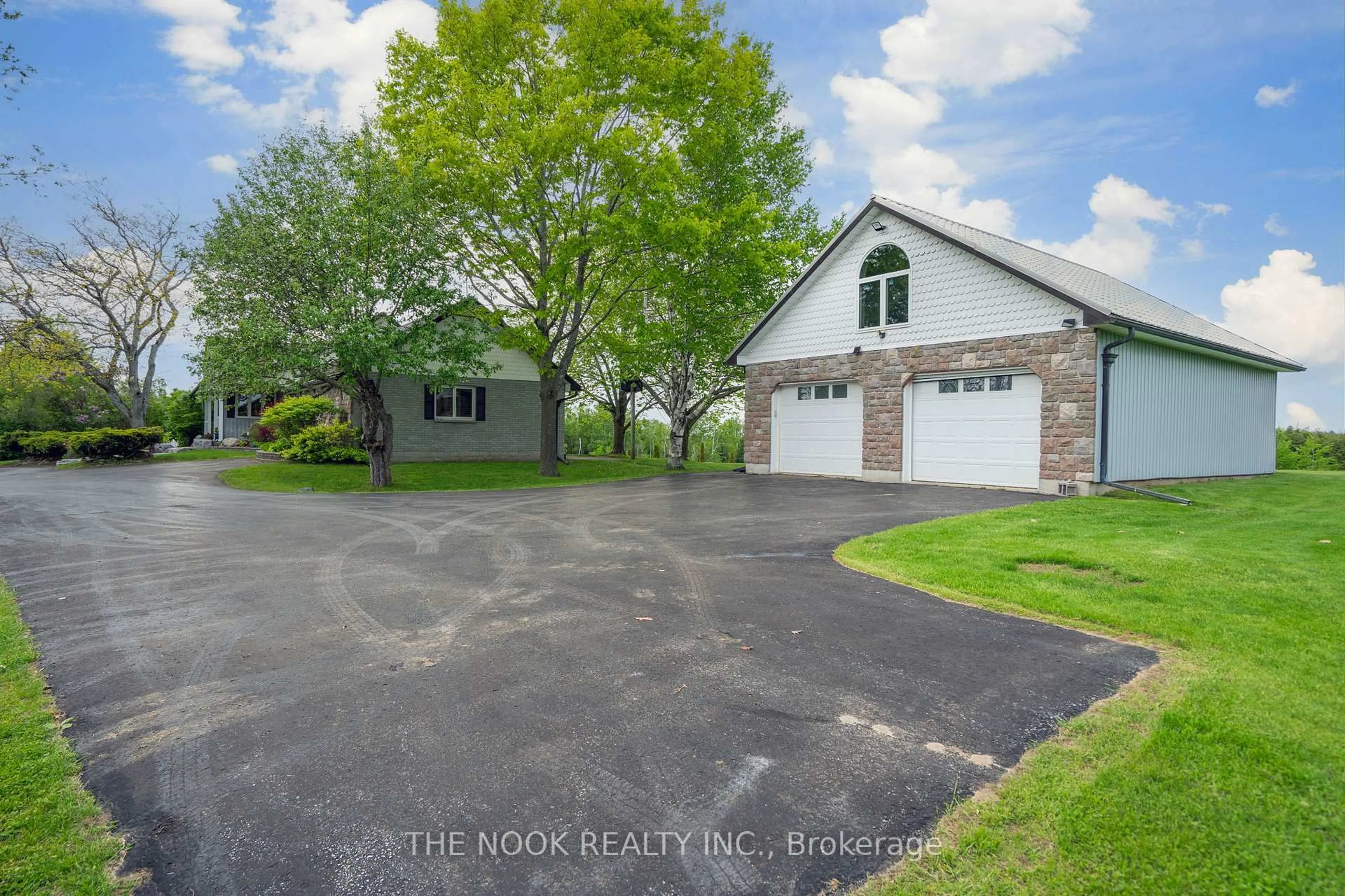 A pic from outside/outdoor area/front of a property/back of a property/a pic from drone, water/lake/river/ocean view for 593 Pigeon Creek Rd, Kawartha Lakes Ontario L0B 1K0