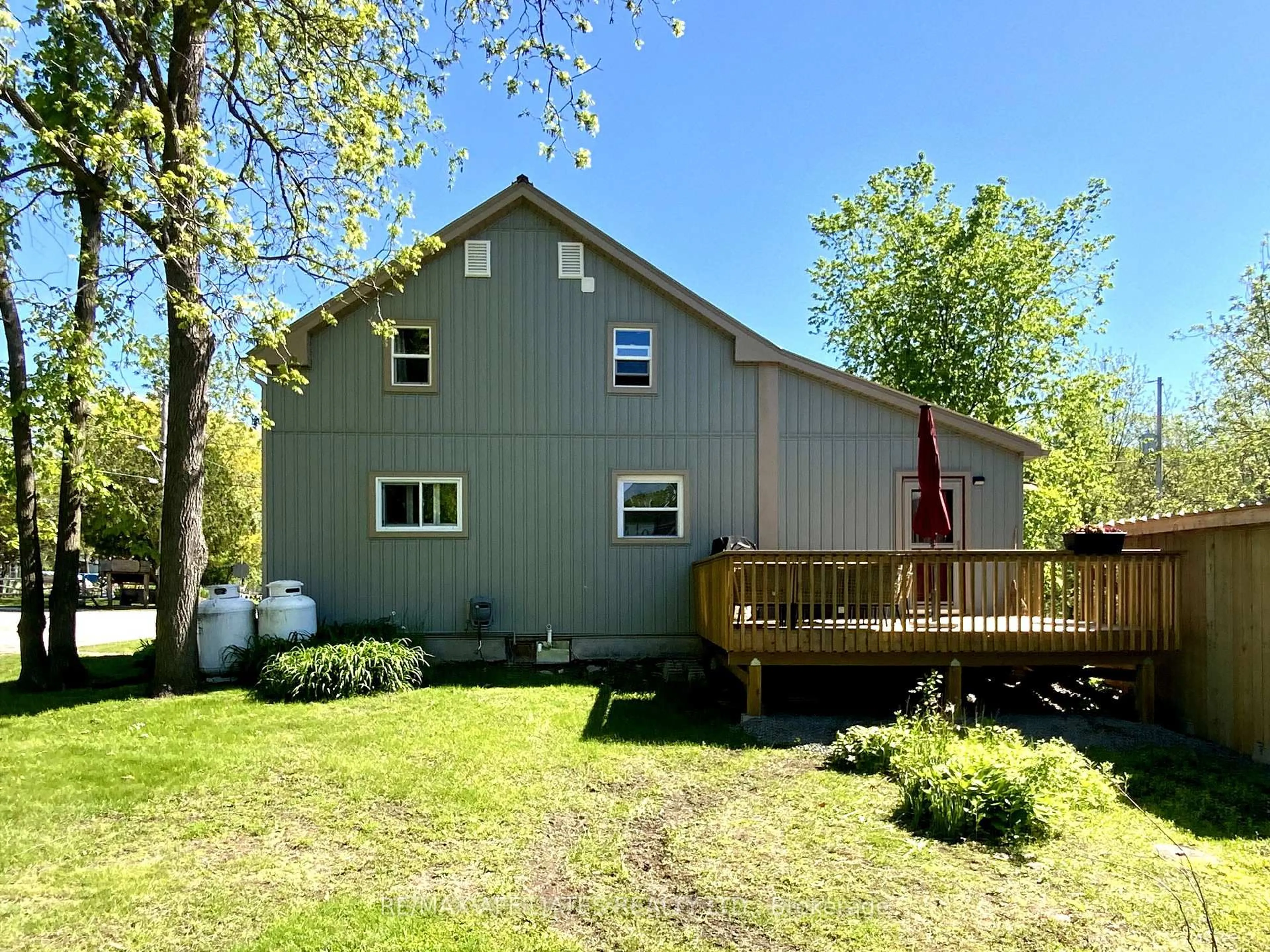 A pic from outside/outdoor area/front of a property/back of a property/a pic from drone, water/lake/river/ocean view for 8 Stevens St, Rideau Lakes Ontario K0G 1P0