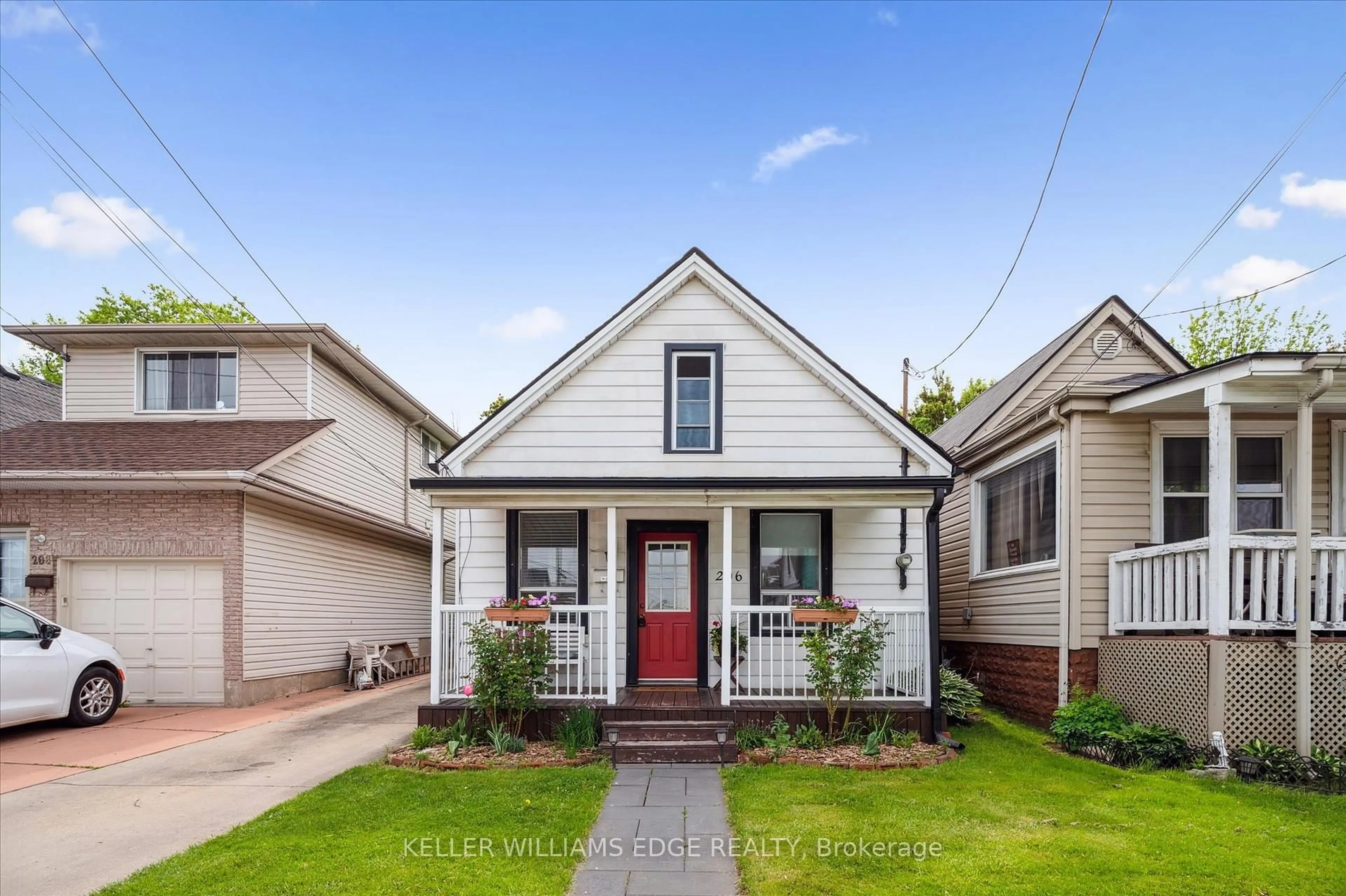 Home with brick exterior material, street for 206 Province St, Hamilton Ontario L8H 4J1