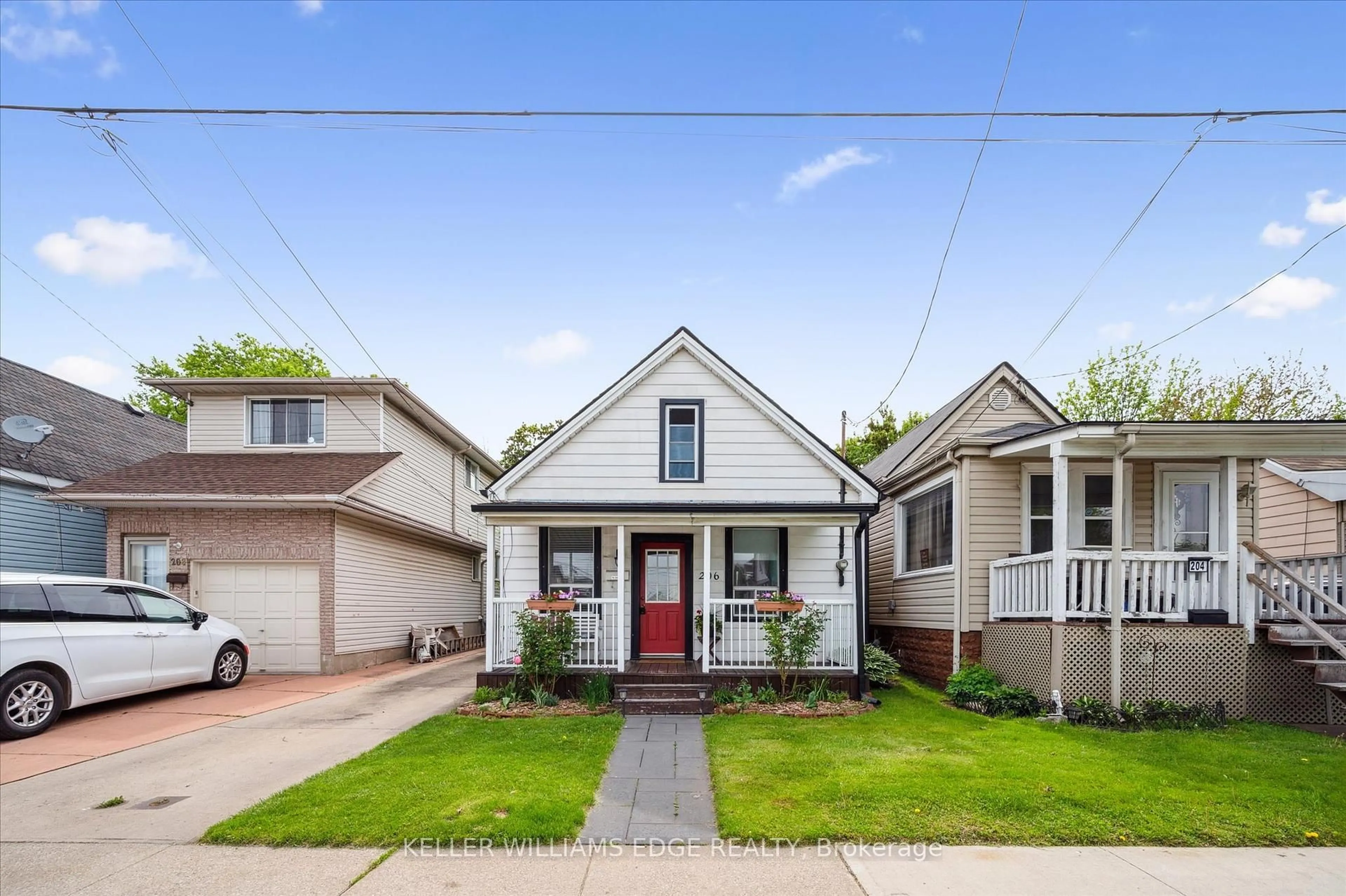 Home with brick exterior material, street for 206 Province St, Hamilton Ontario L8H 4J1