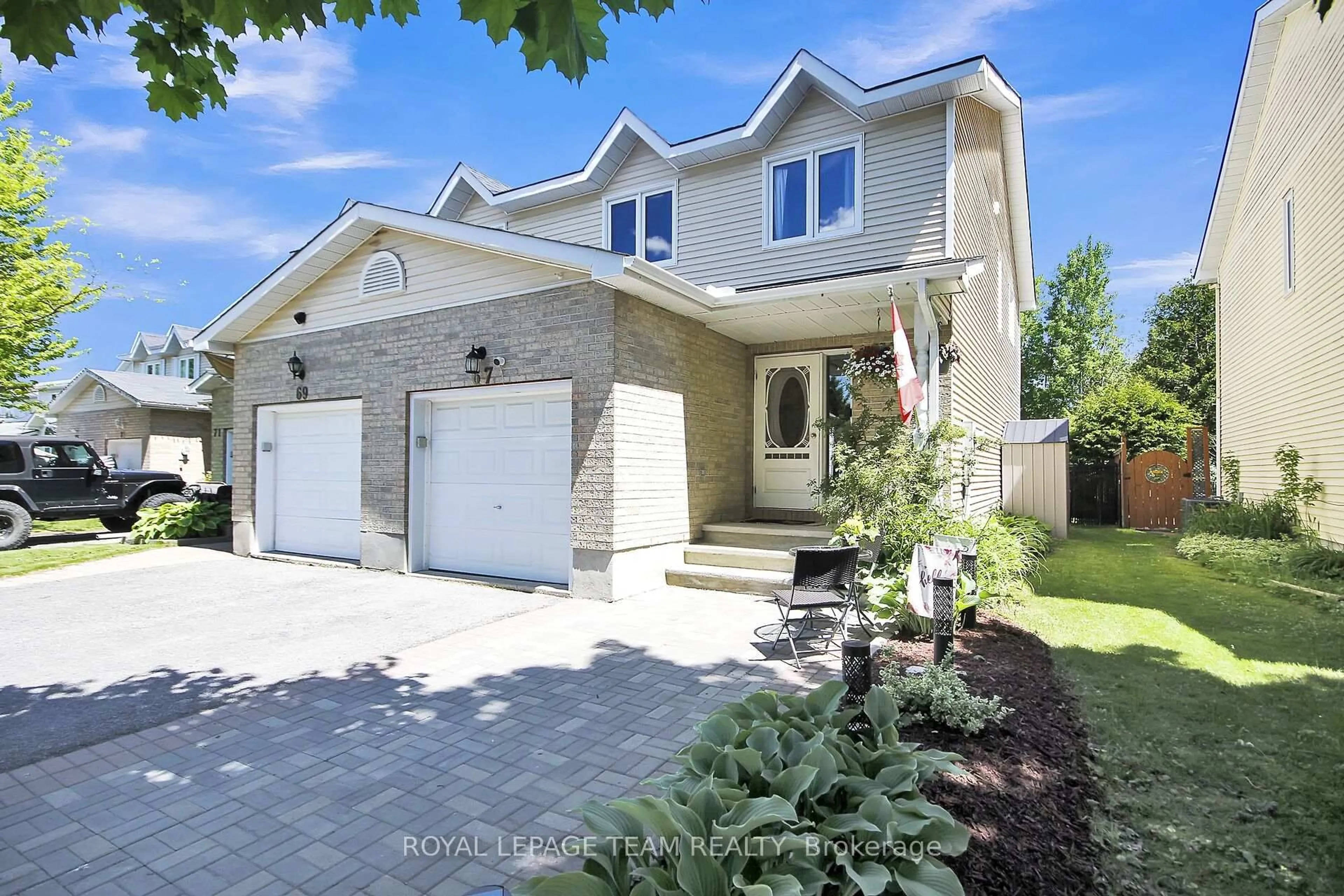 Home with brick exterior material, street for 67 Kathleen Cres, Stittsville Ontario K2S 1L8