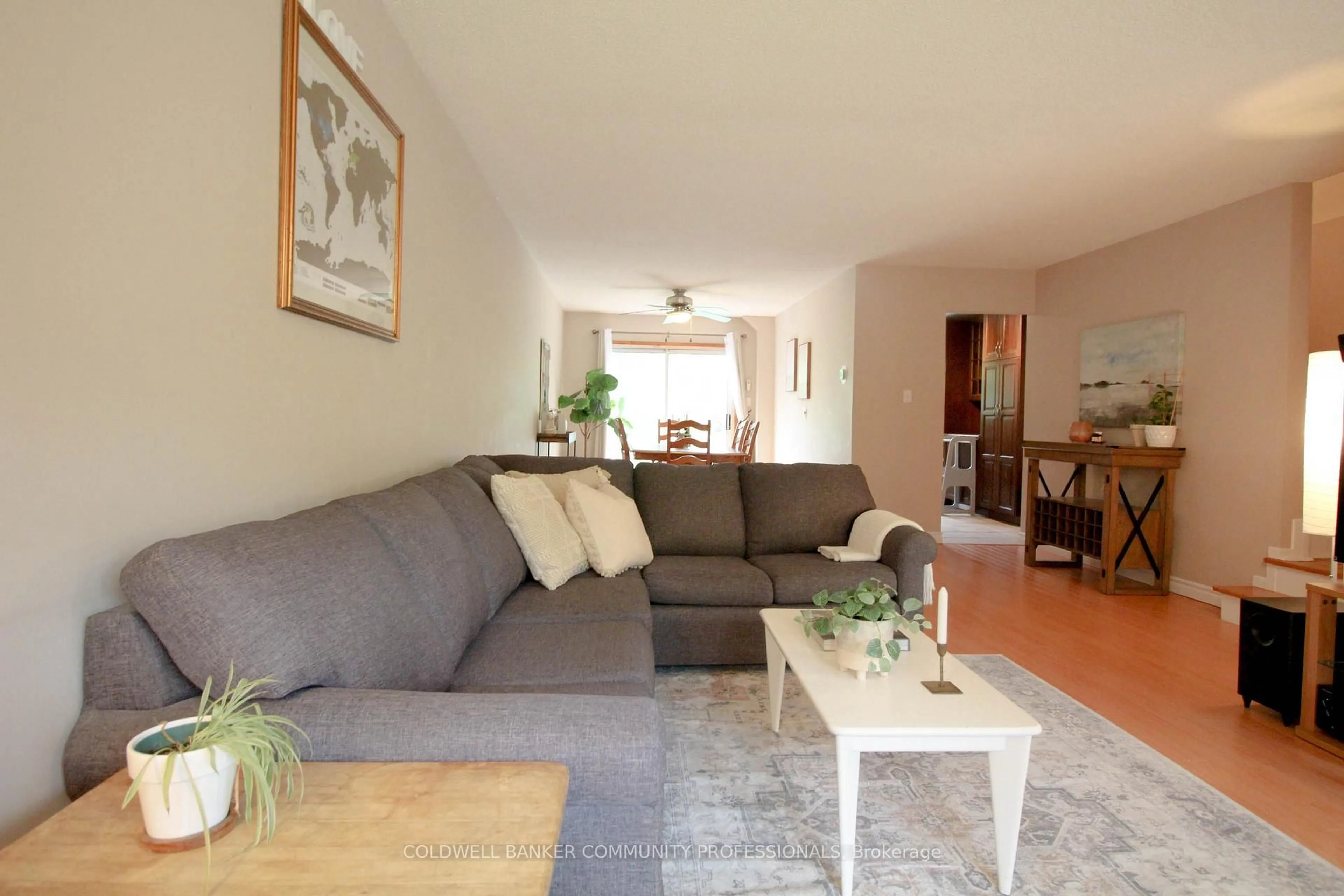 Living room with furniture, wood/laminate floor for 657 Albert St #G, Waterloo Ontario N2L 3V5