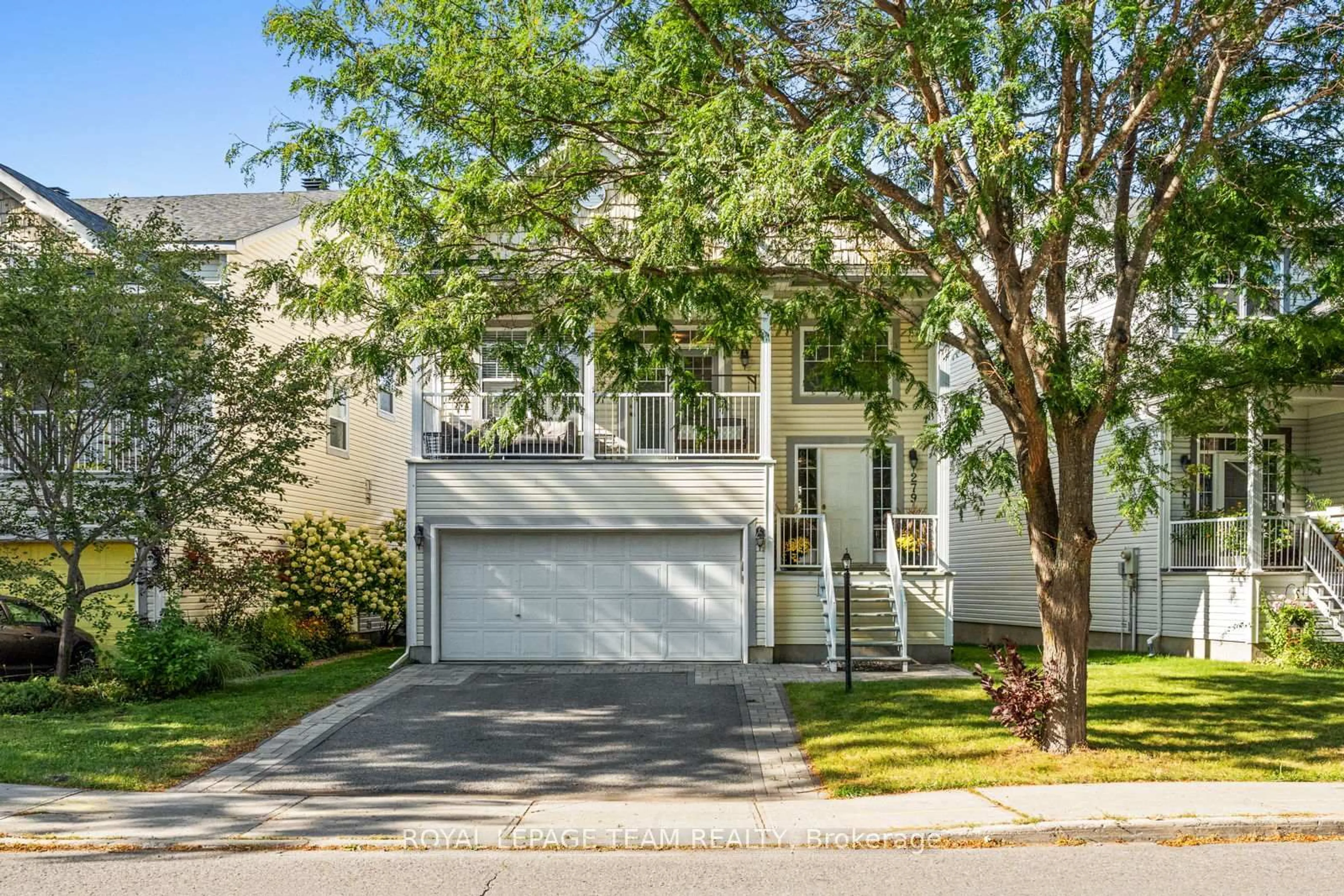 Home with vinyl exterior material, street for 279 Berrigan Dr, Ottawa Ontario K2J 5C3