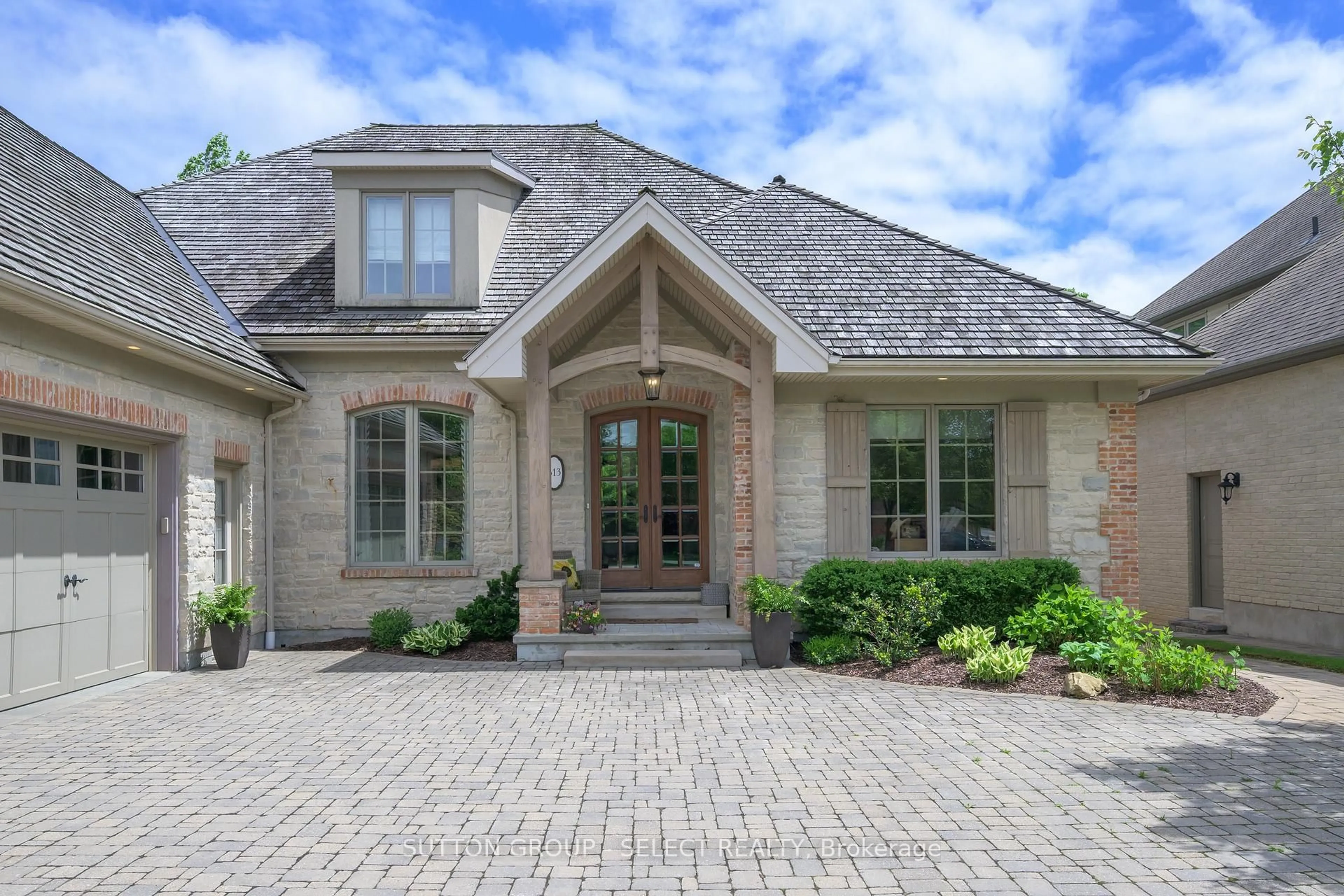 Home with brick exterior material, street for 613 Eagletrace Dr, London North Ontario N6G 0E8
