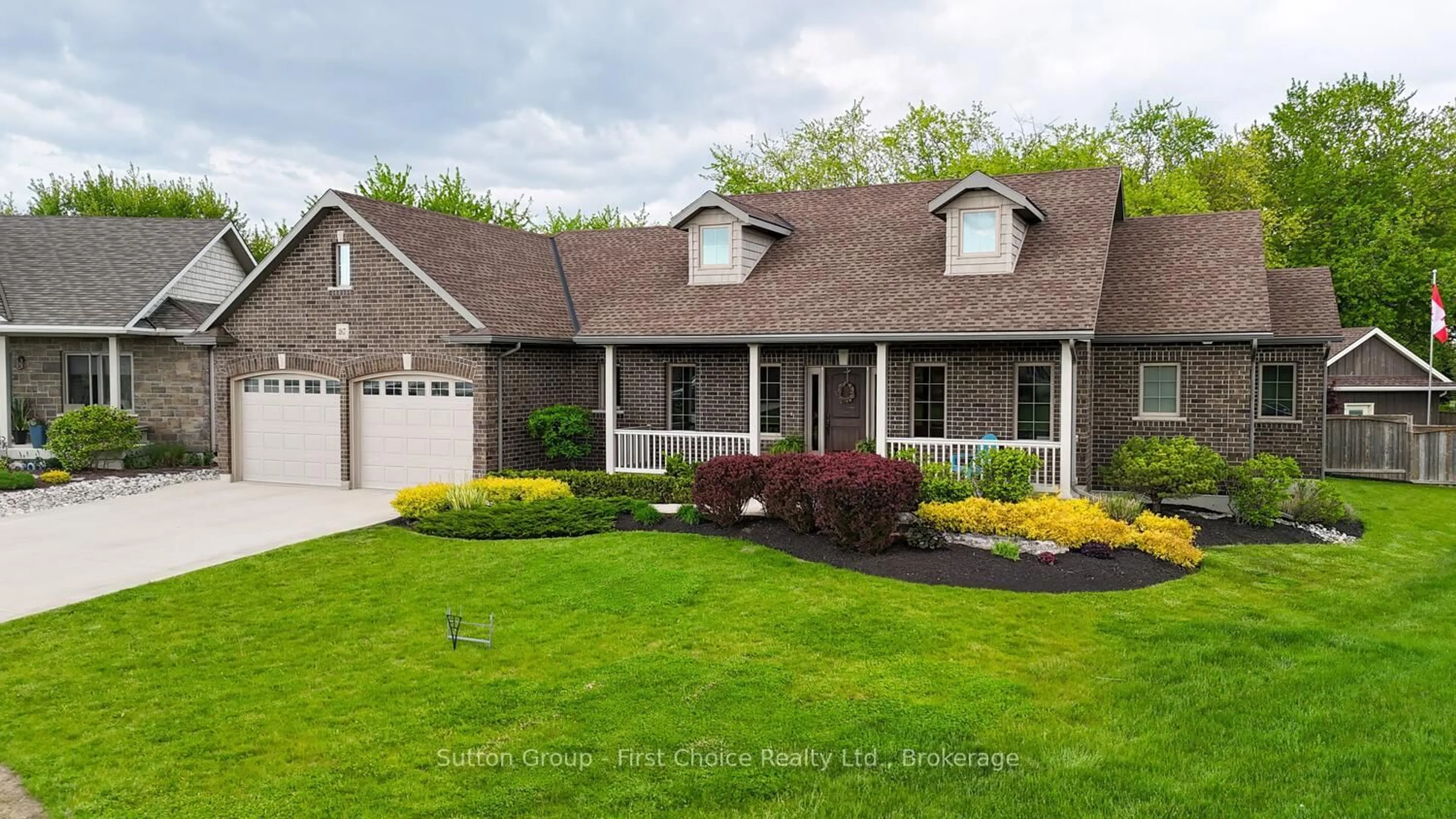 Home with vinyl exterior material, street for 267 Sunset Dr, West Perth Ontario N0K 1N0