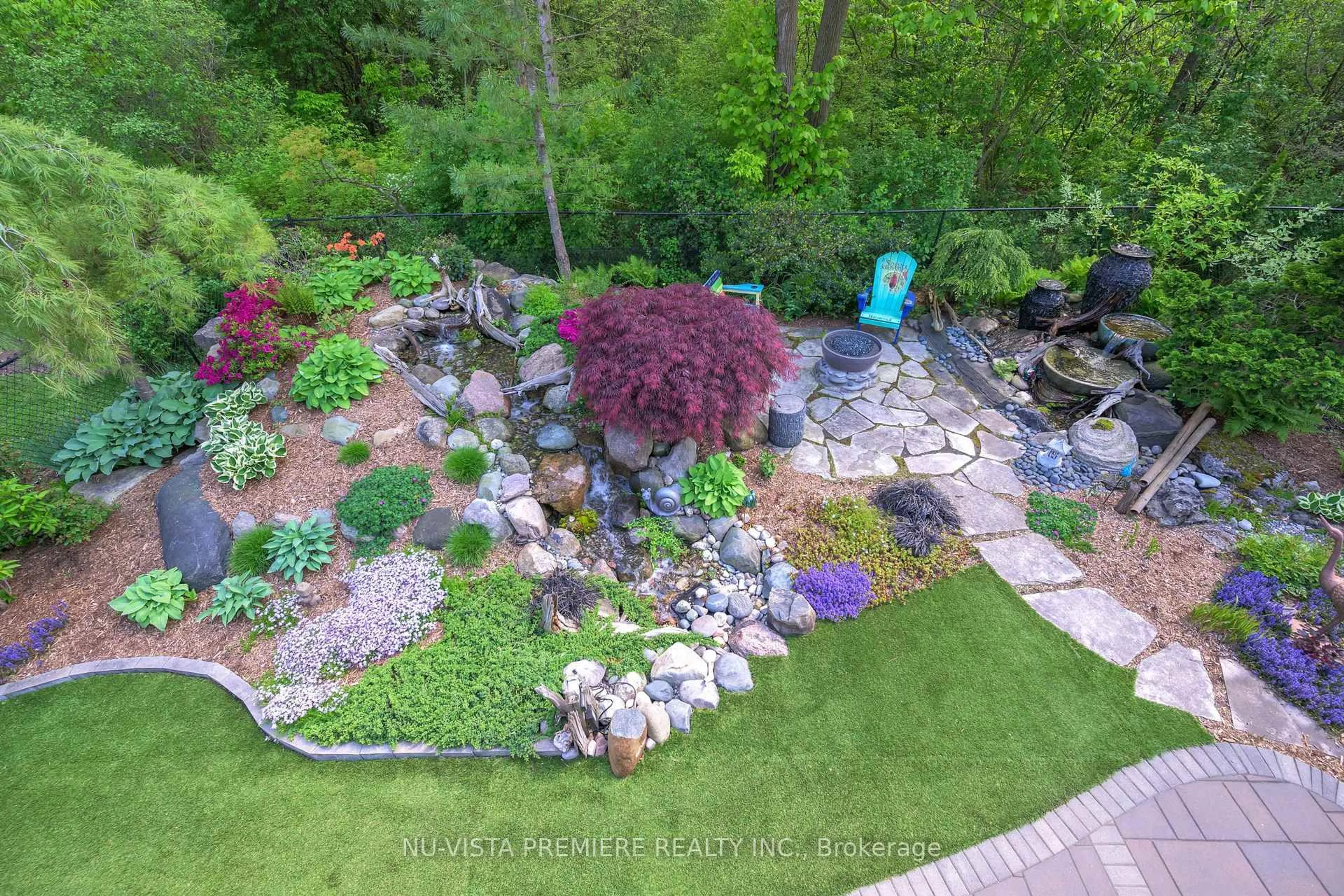 A pic from outside/outdoor area/front of a property/back of a property/a pic from drone, water/lake/river/ocean view for 1585 Blackmaple Cres, London East Ontario N5Y 6L7