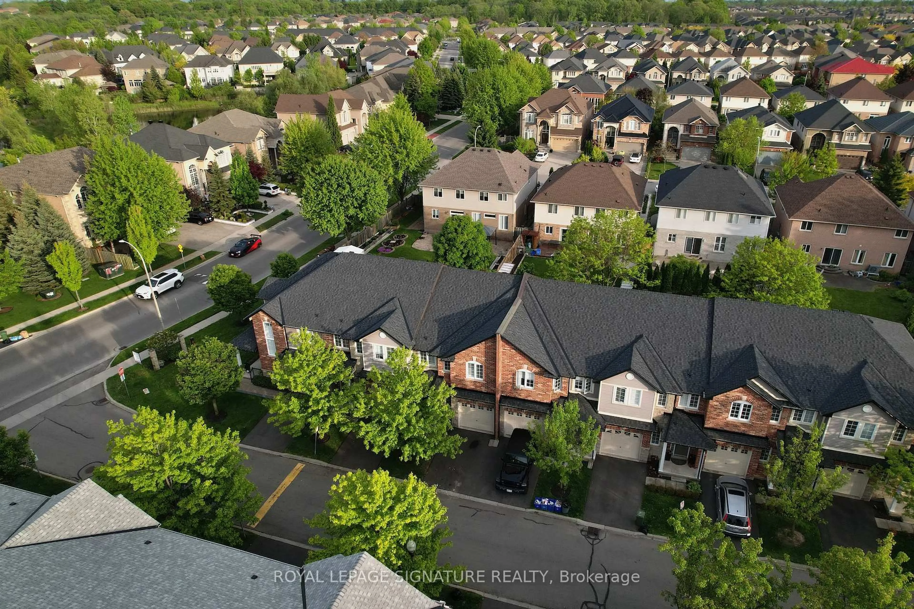 A pic from outside/outdoor area/front of a property/back of a property/a pic from drone, street for 60 Cloverleaf Dr #48, Hamilton Ontario L9K 1S8