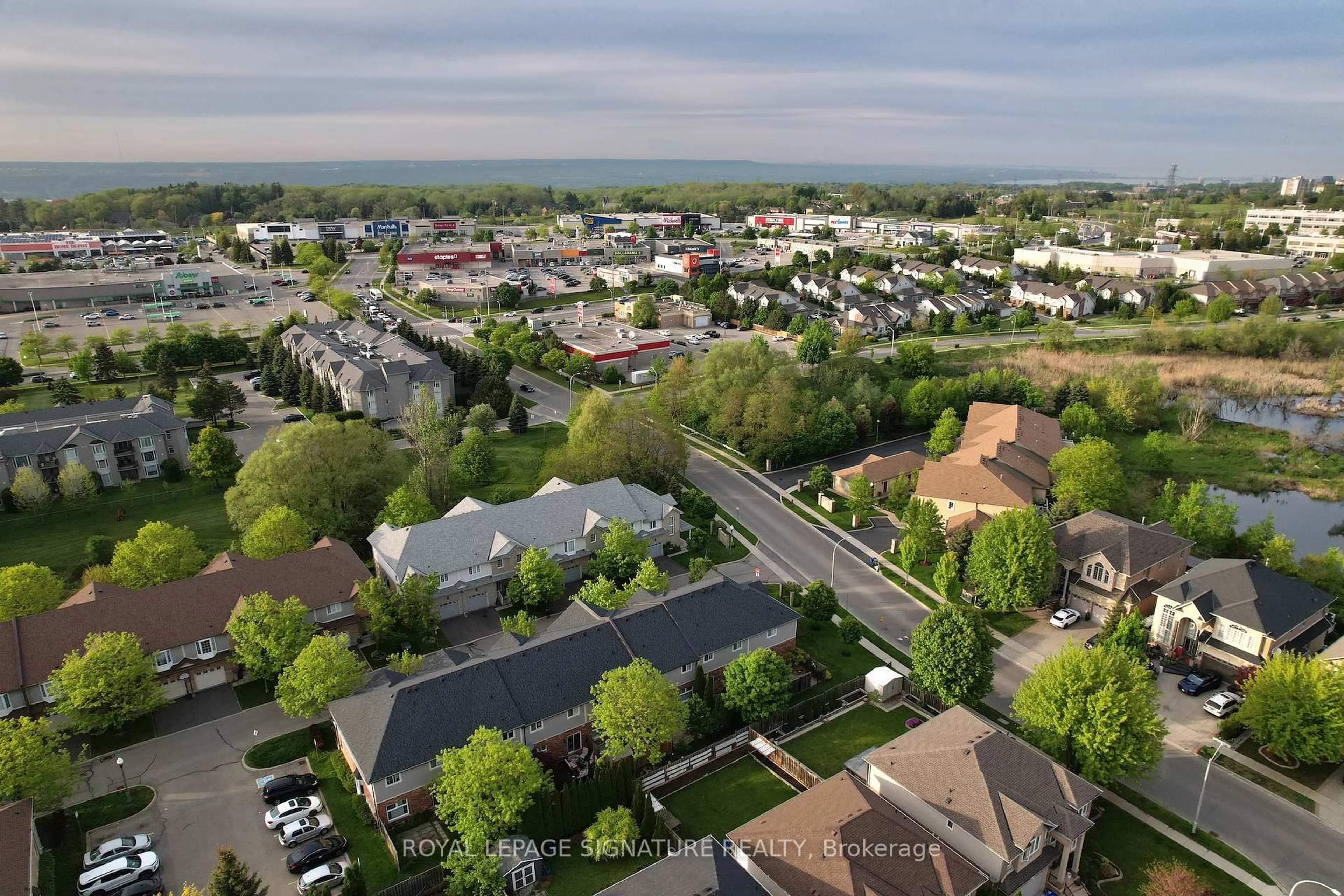 A pic from outside/outdoor area/front of a property/back of a property/a pic from drone, street for 60 Cloverleaf Dr #48, Hamilton Ontario L9K 1S8