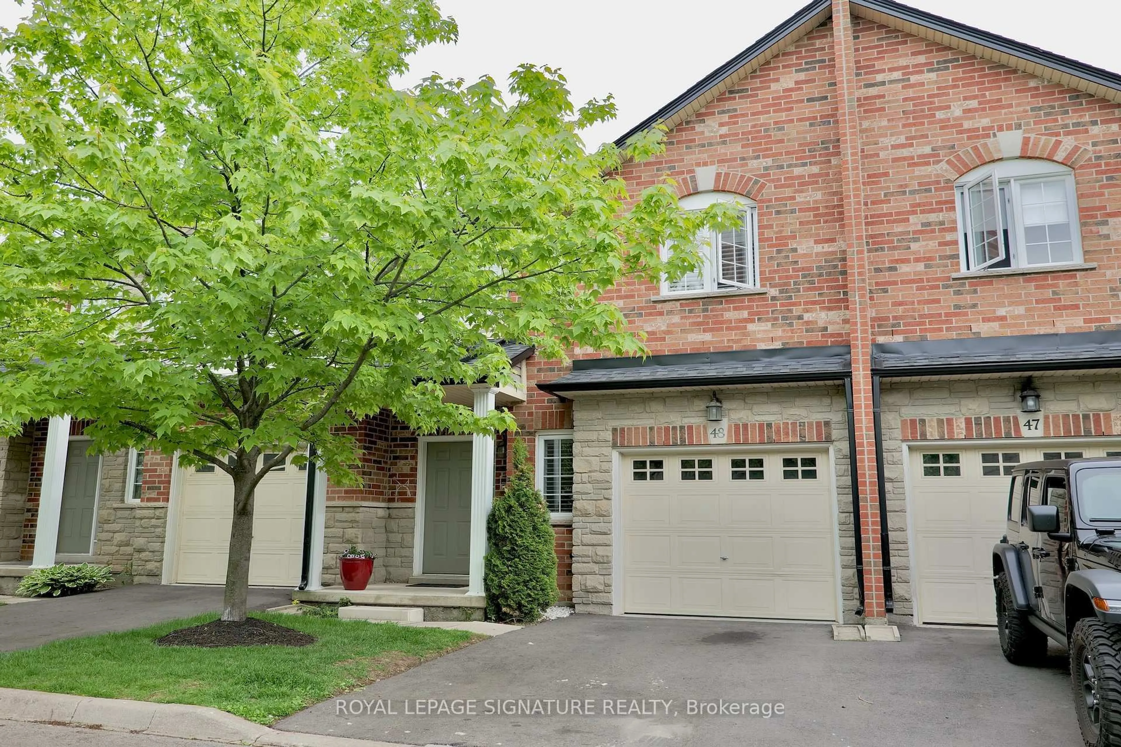 Home with brick exterior material, street for 60 Cloverleaf Dr #48, Hamilton Ontario L9K 1S8