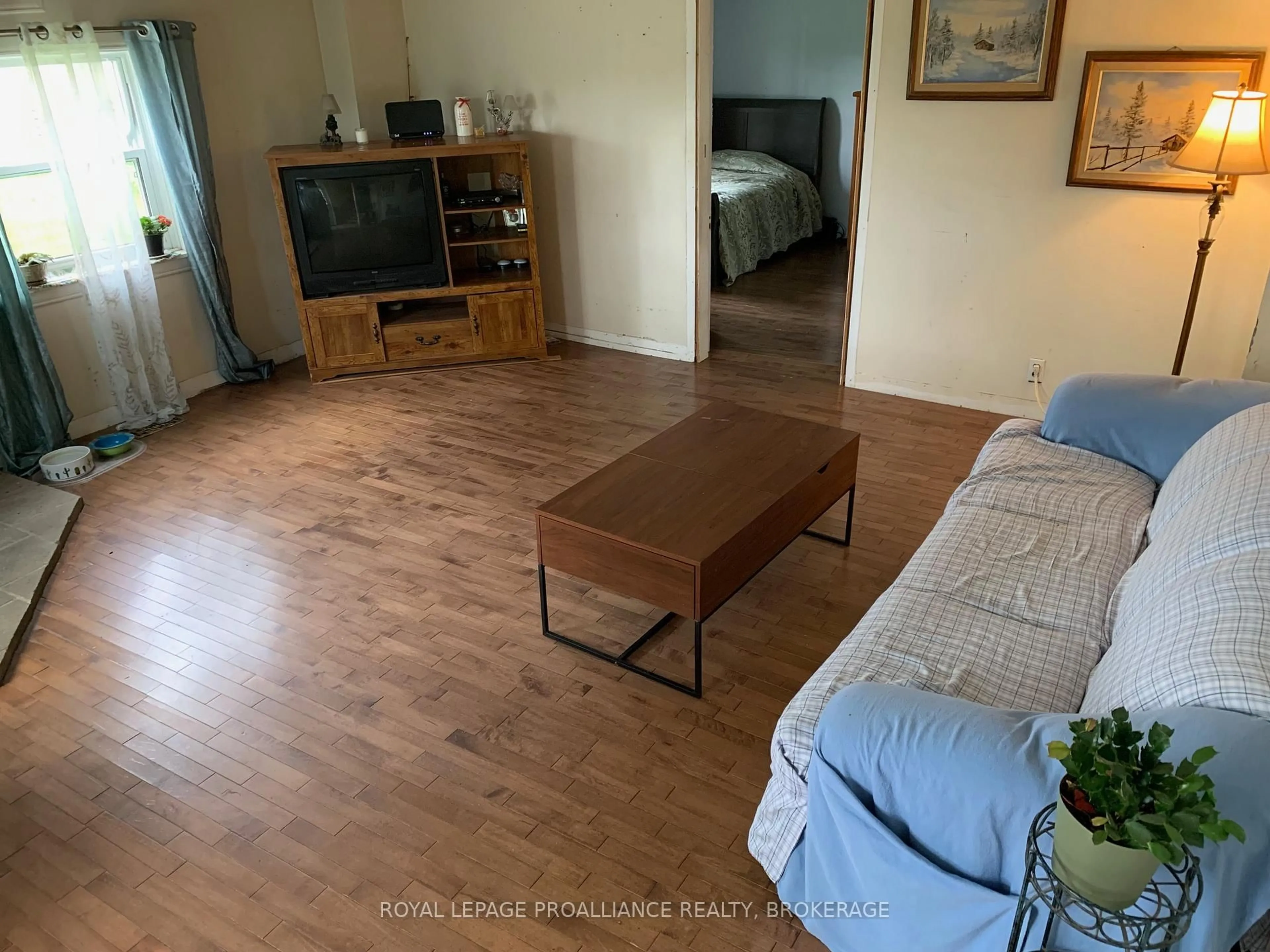 Living room with furniture, unknown for 4156 Stage Coach Rd, Sydenham Ontario K0H 2T0