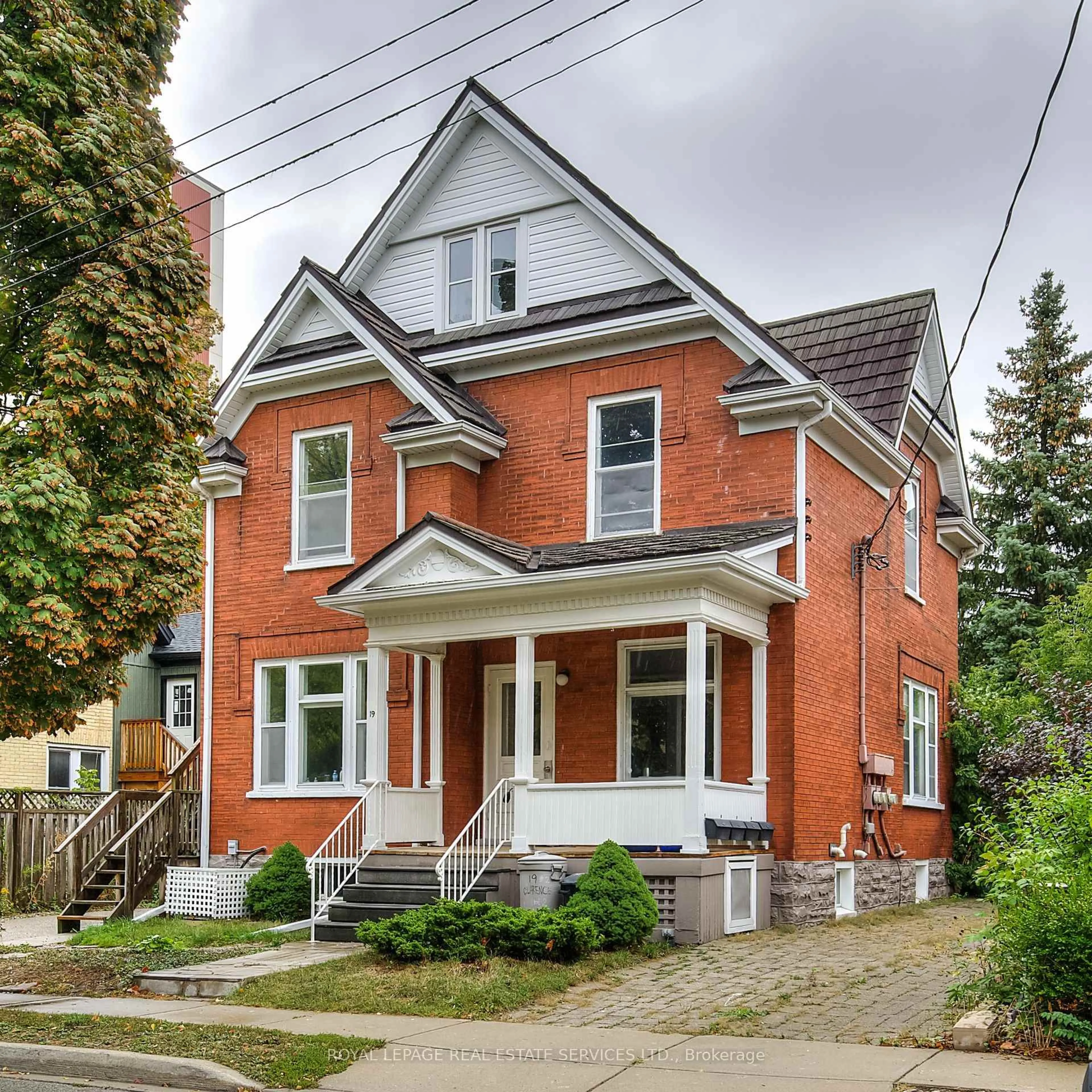 Home with brick exterior material, street for 19 Clarence Pl, Kitchener Ontario N2H 2L1