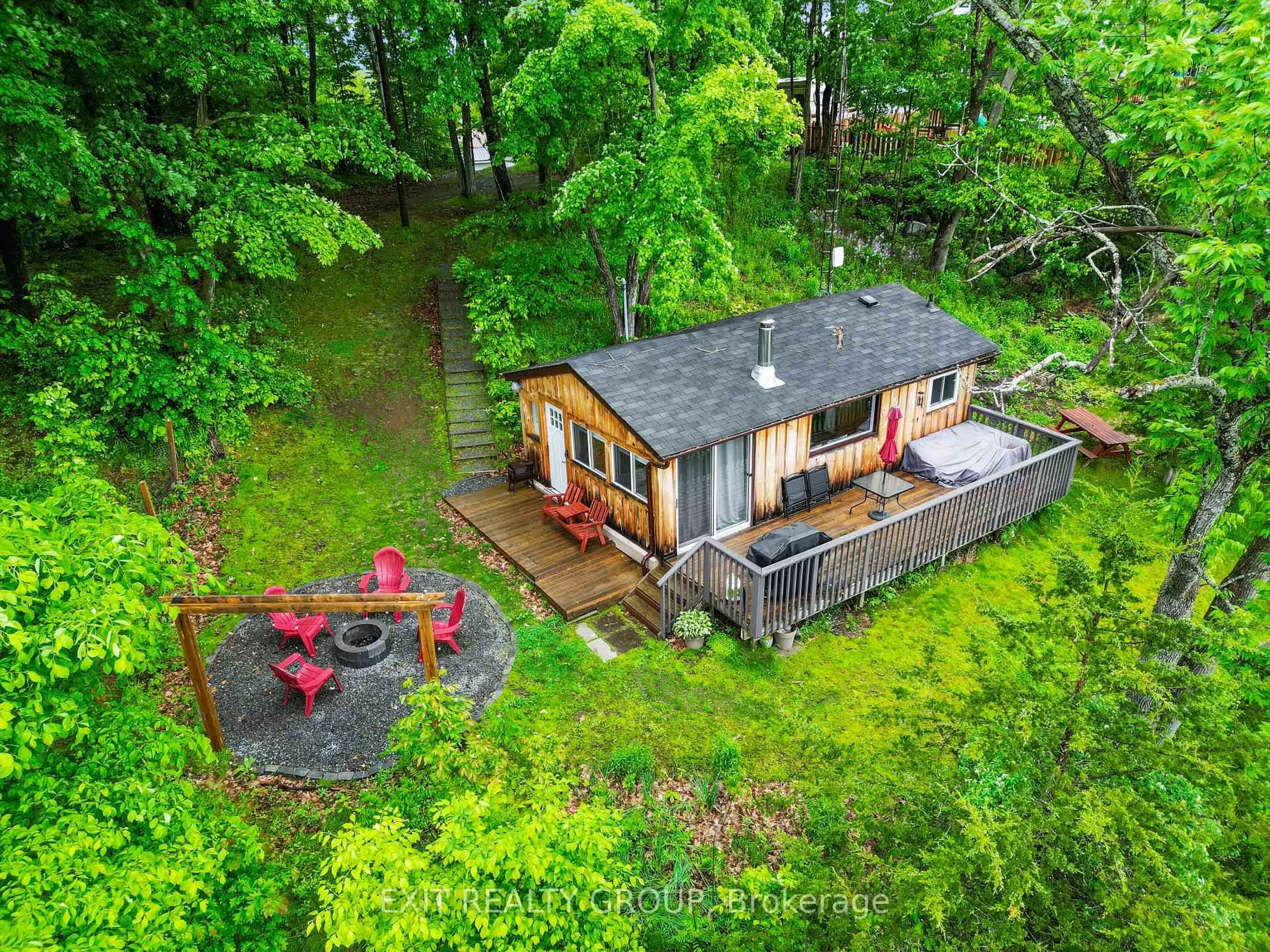 A pic from outside/outdoor area/front of a property/back of a property/a pic from drone, unknown for 734 Marble Point Rd, Limoges Ontario K0K 2M0