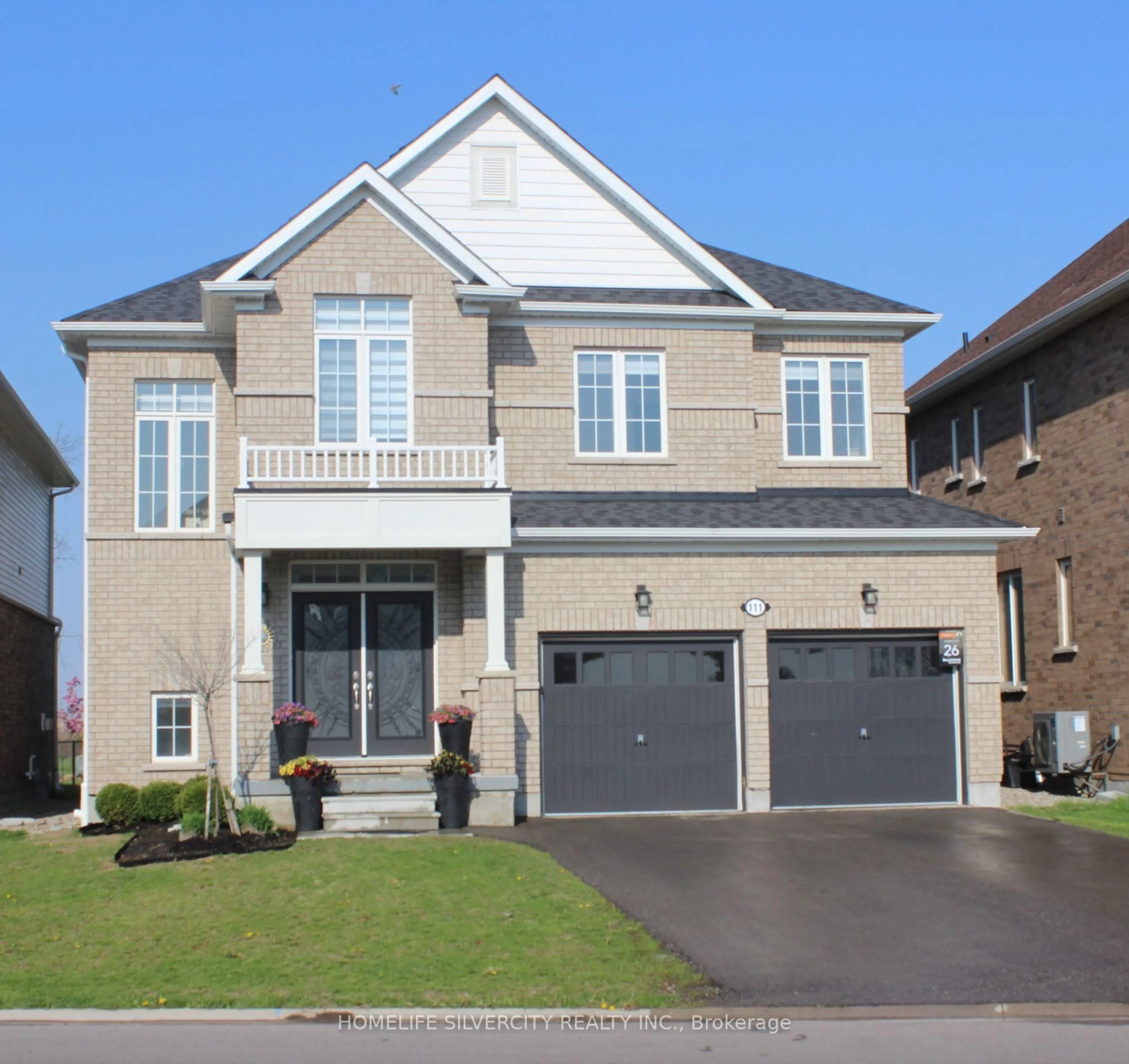 Home with brick exterior material, street for 111 Oak Ave, Brant Ontario N3L 0J6