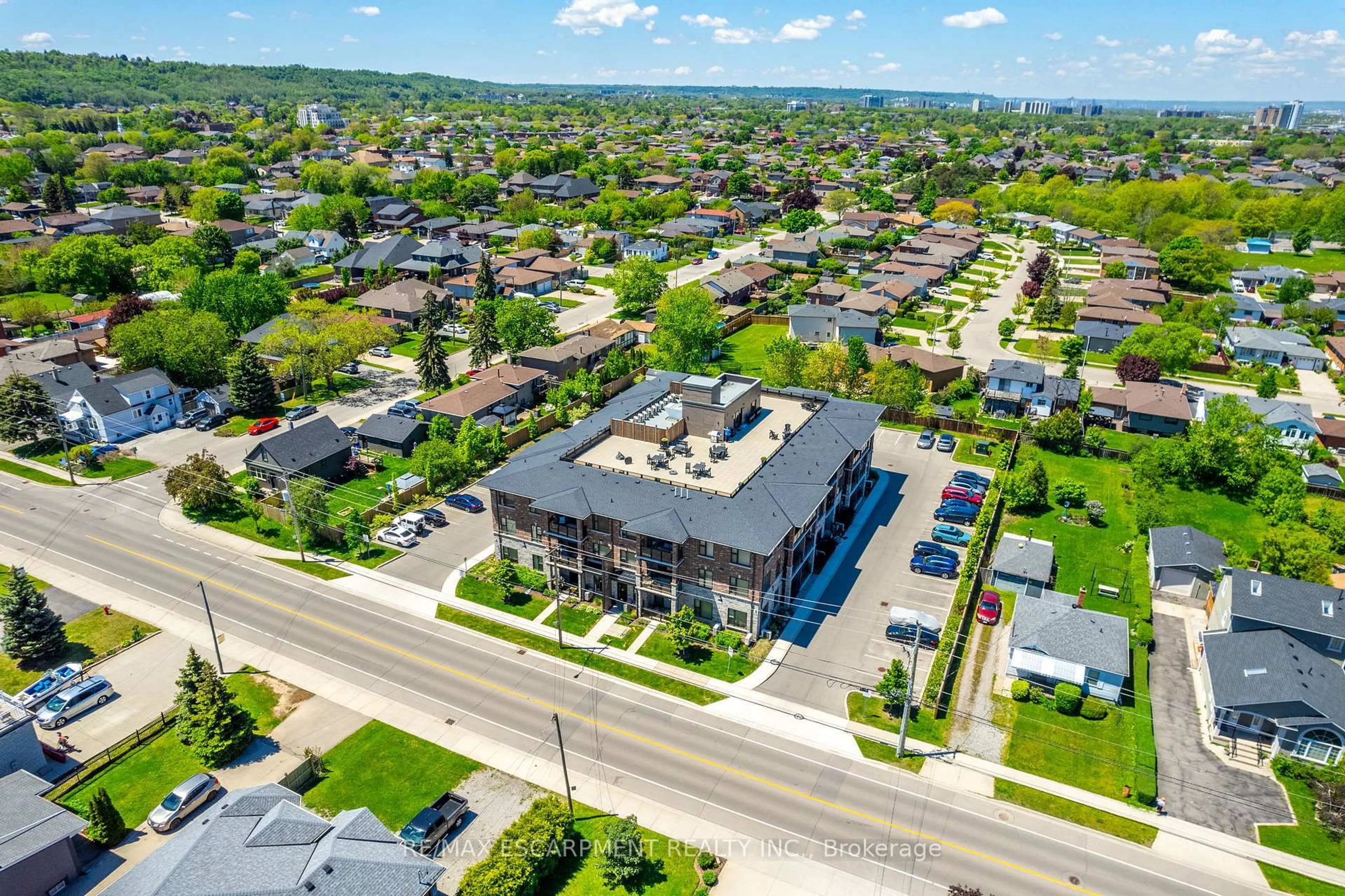 A pic from outside/outdoor area/front of a property/back of a property/a pic from drone, street for 257 Millen Rd #312, Hamilton Ontario L8E 2H1