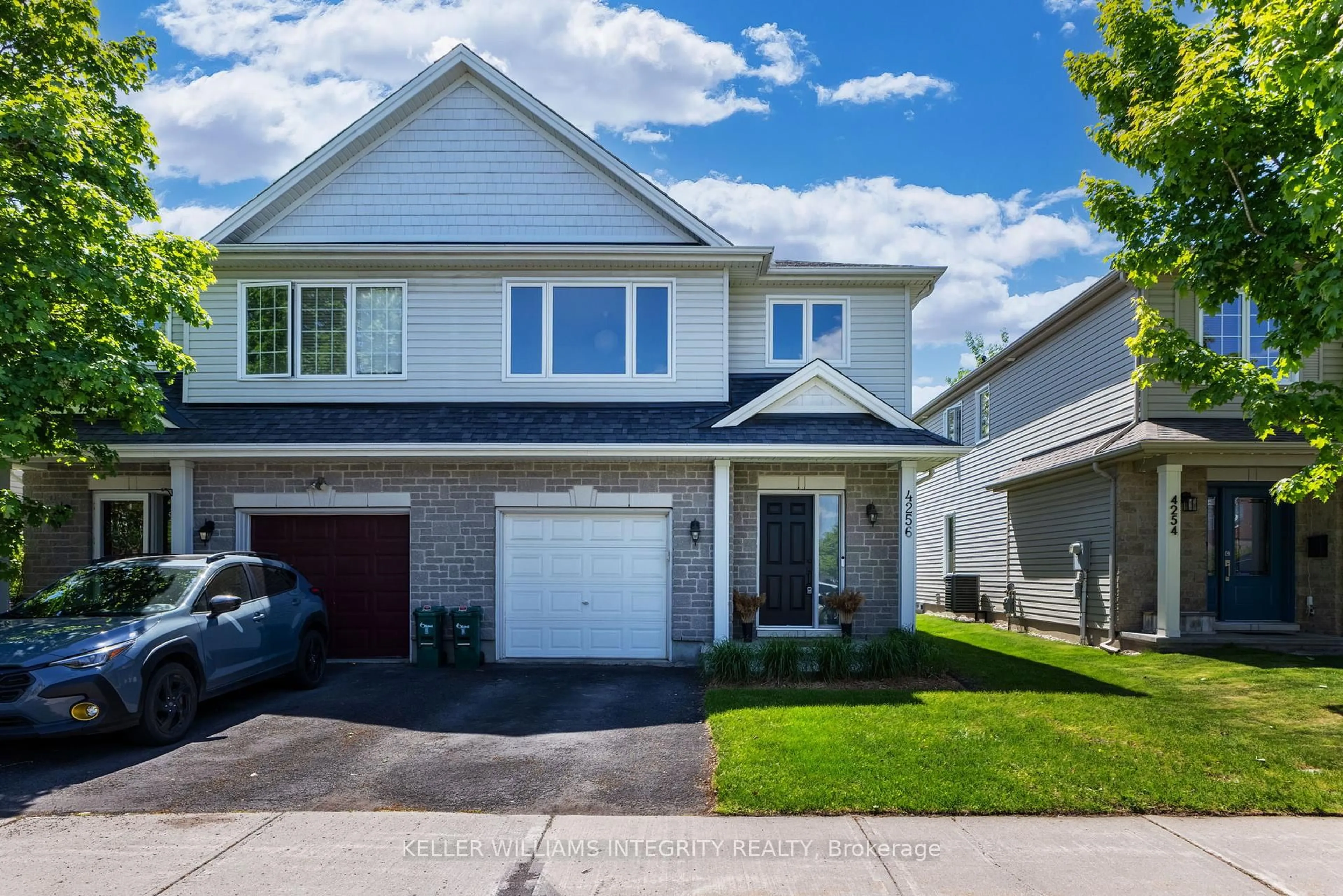 Home with vinyl exterior material, street for 4256 Kelly Farm Dr, Ottawa Ontario K1T 0A6