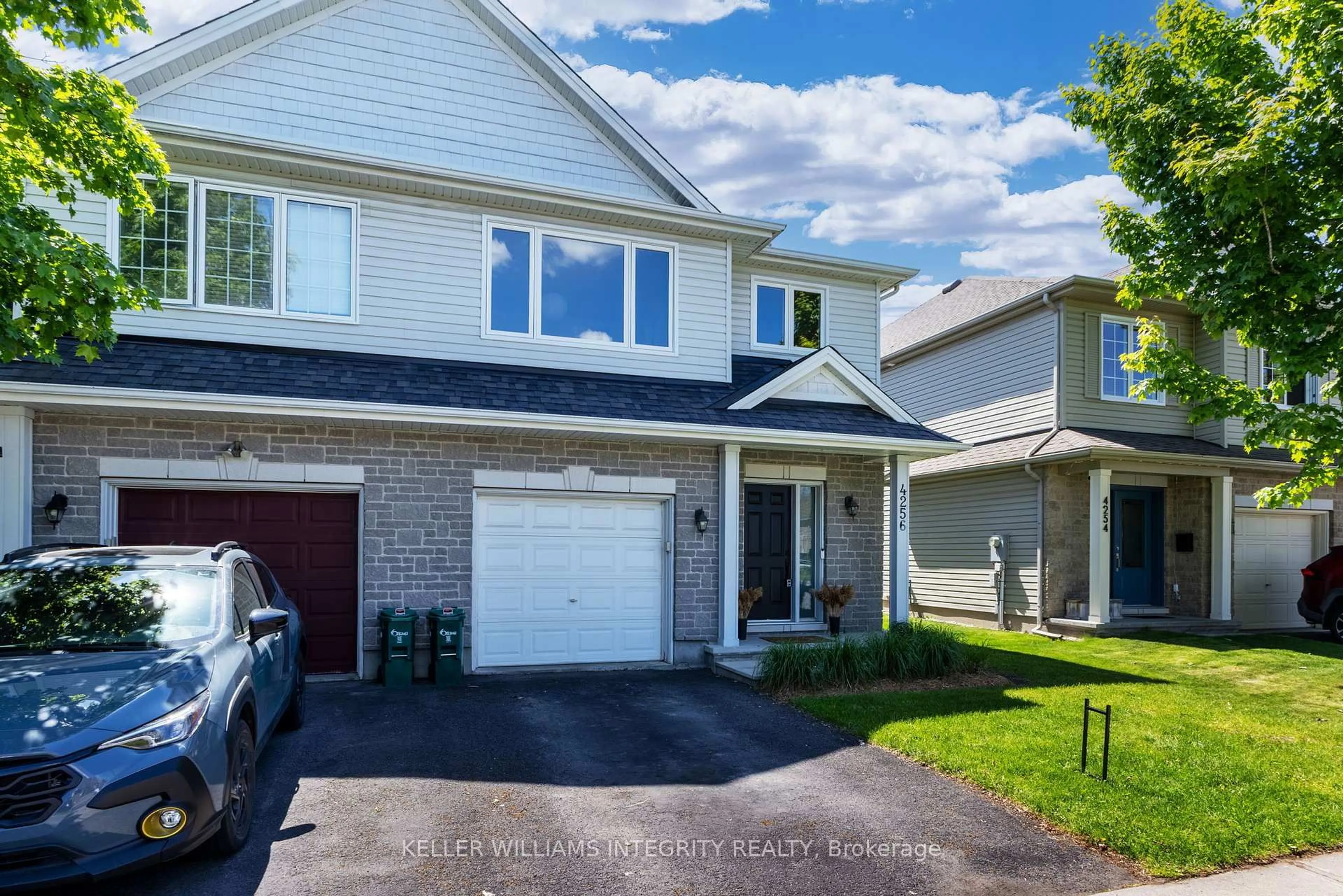 Home with vinyl exterior material, street for 4256 Kelly Farm Dr, Ottawa Ontario K1T 0A6