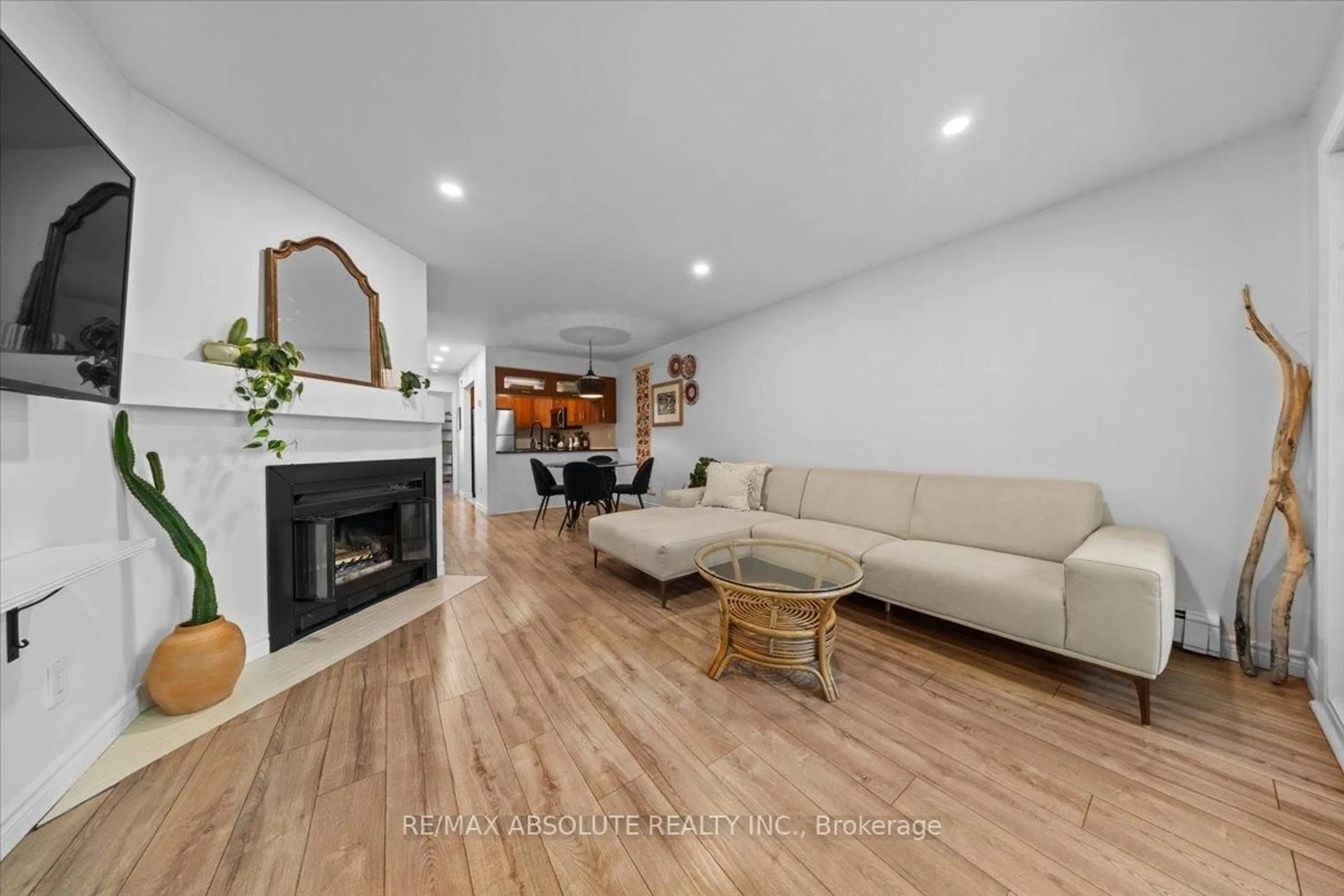 Living room with furniture, wood/laminate floor for 1182 BLASDELL Ave, Ottawa Ontario K1K 4H5