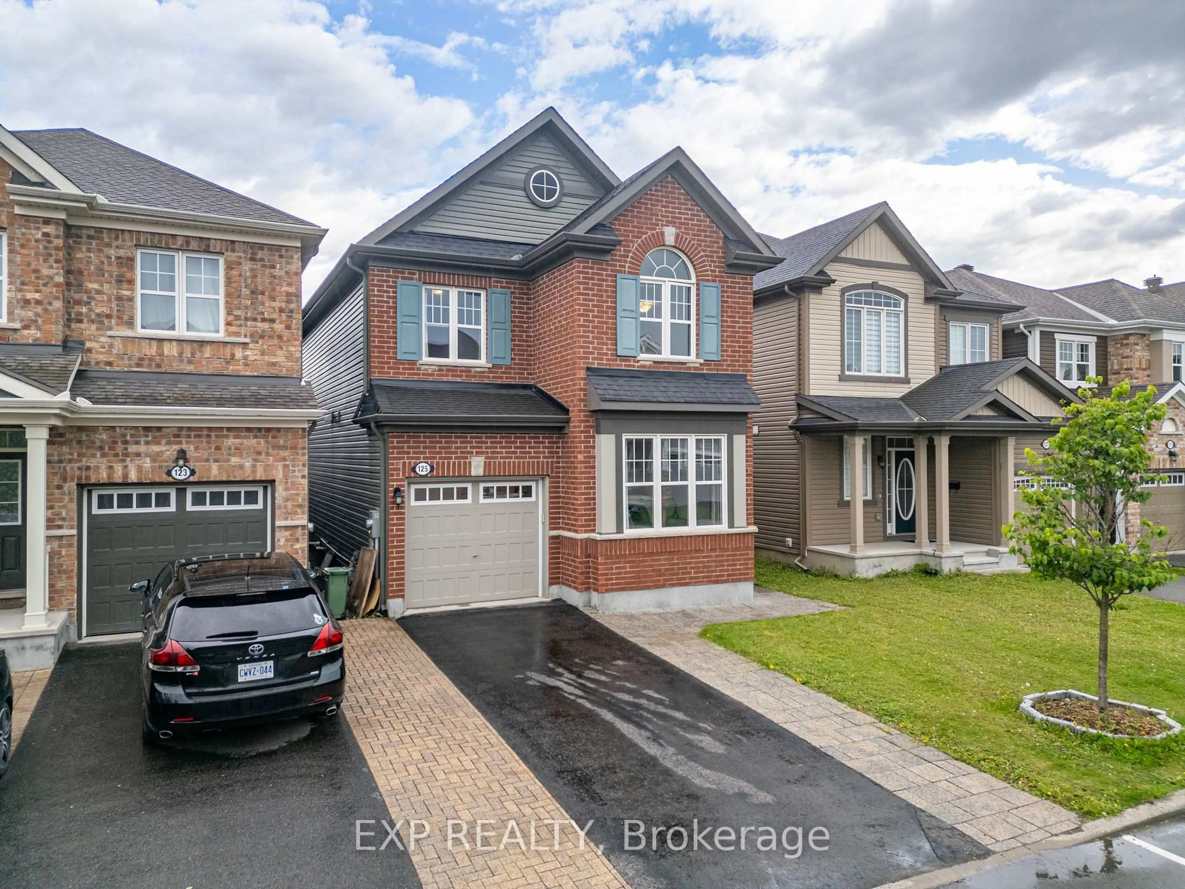 Home with brick exterior material, street for 125 Sweetvalley Dr, Ottawa Ontario K4A 1A4