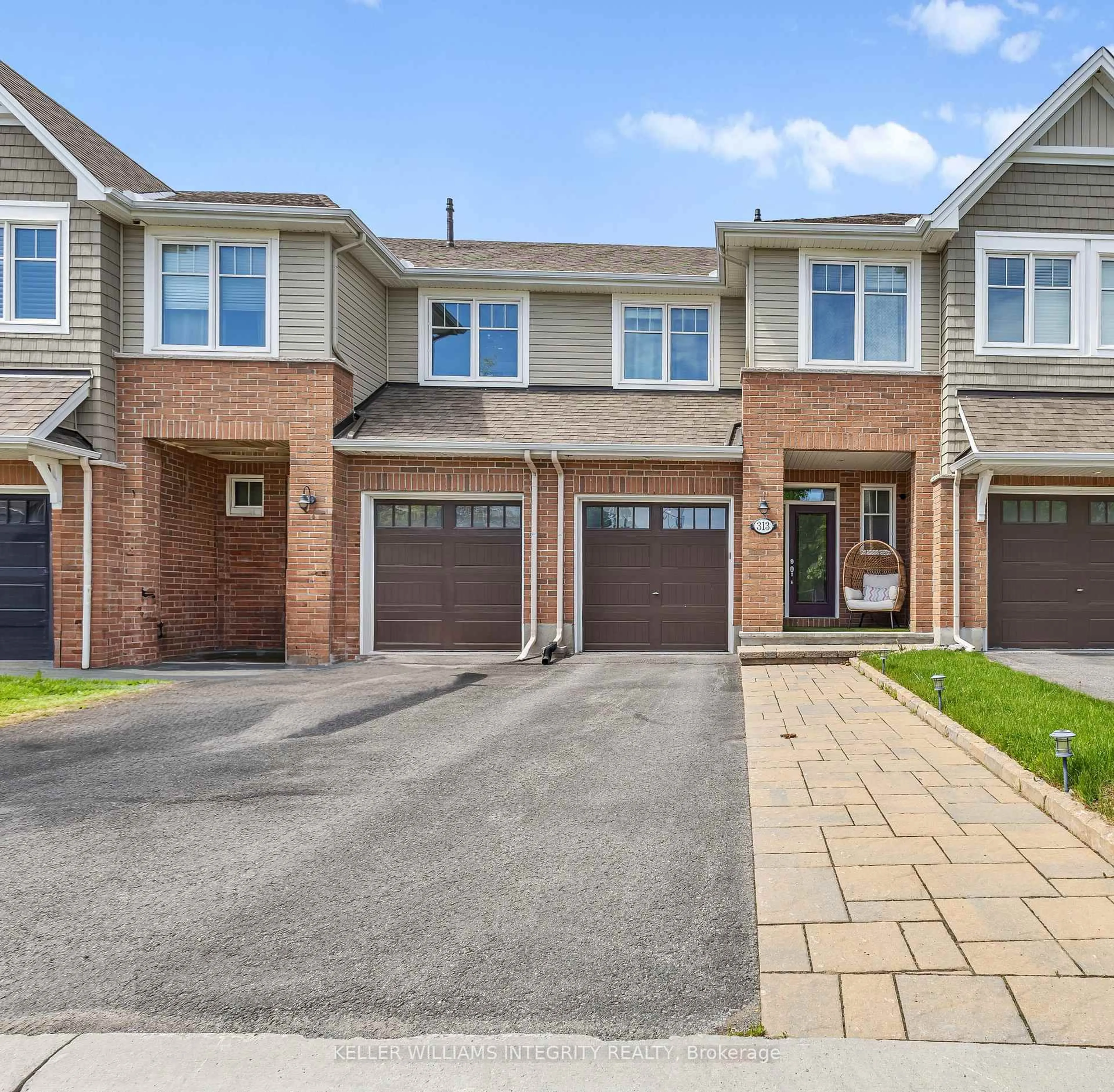 Home with brick exterior material, street for 313 Warmstone Dr, Stittsville Ontario K2S 0N9