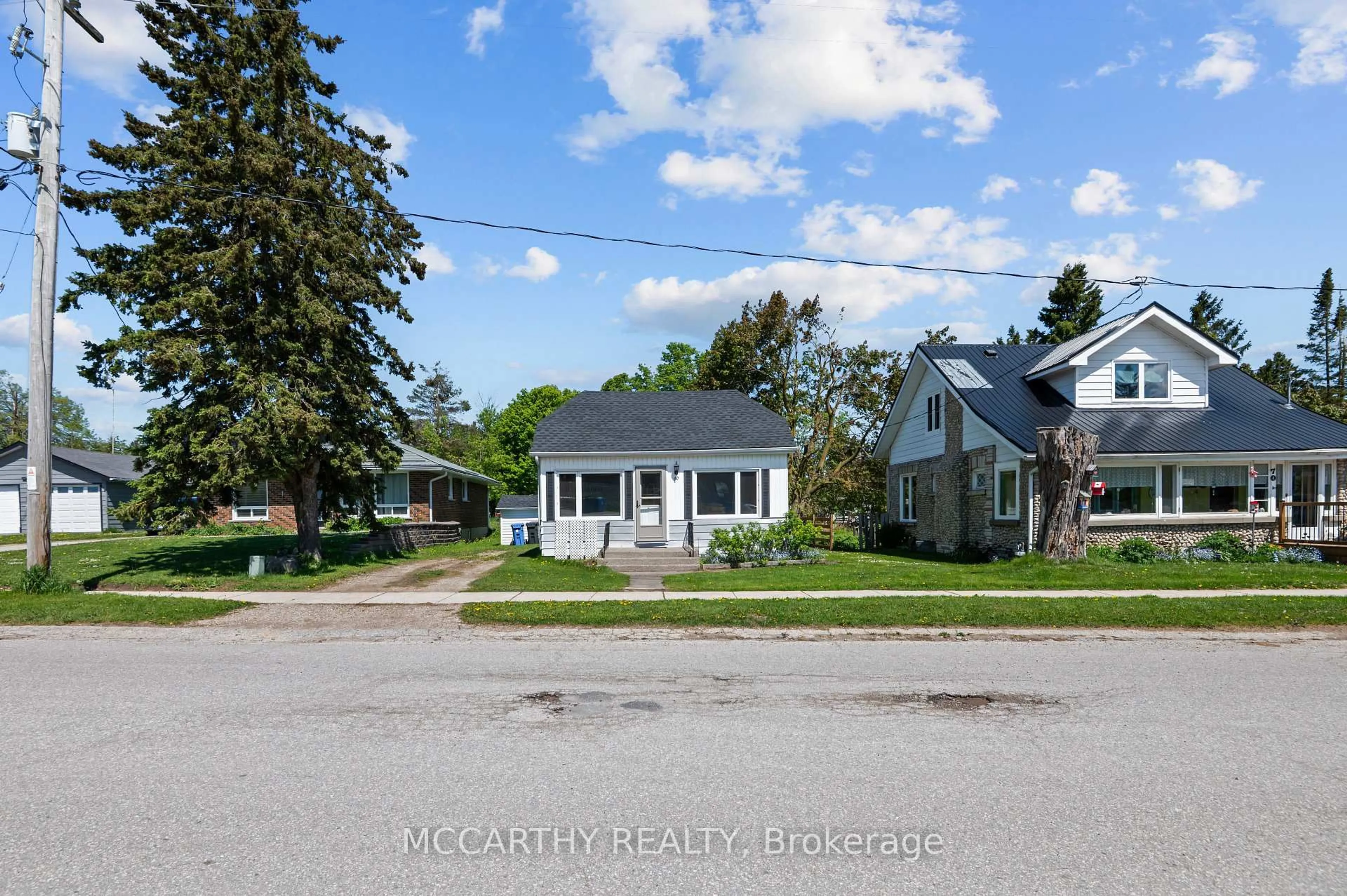 A pic from outside/outdoor area/front of a property/back of a property/a pic from drone, street for 60 Owen Sound St, Southgate Ontario N0C 1B0