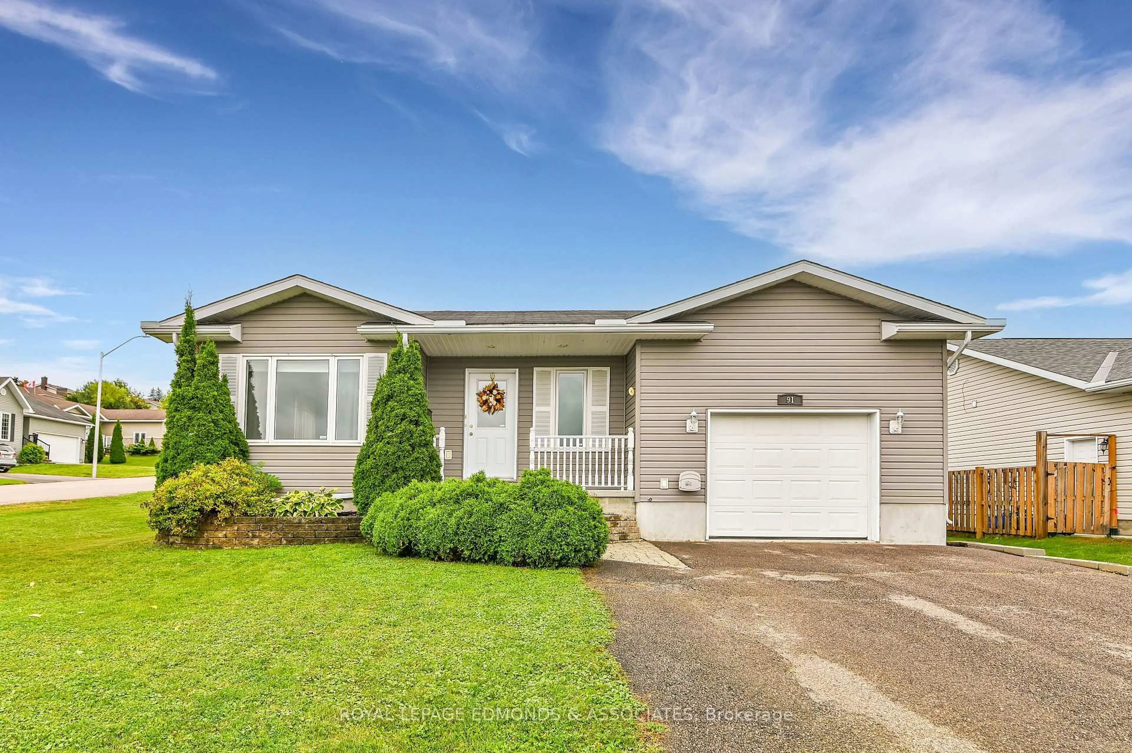 Home with vinyl exterior material, street for 91 Haramis Dr, Renfrew Ontario K7V 4M4