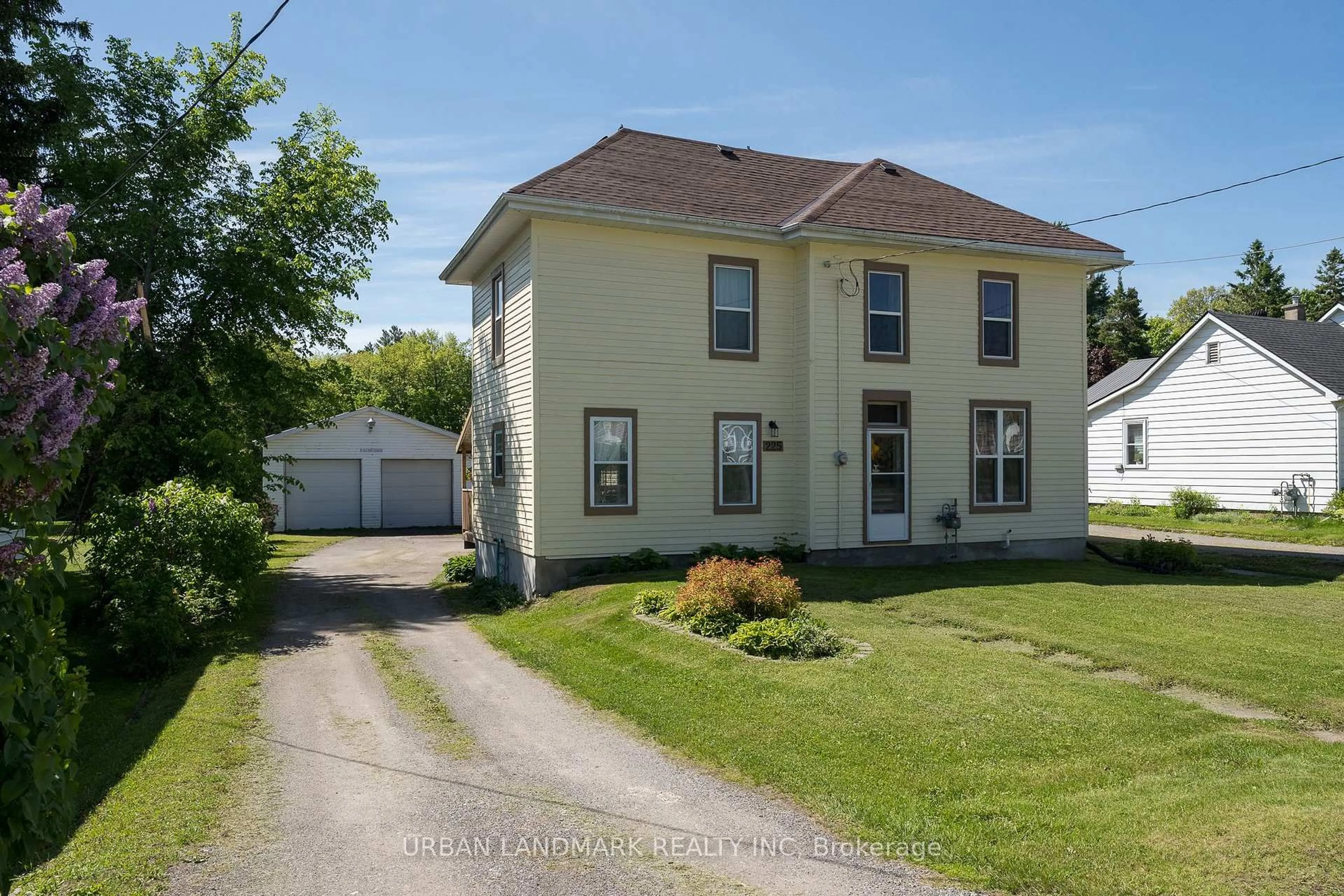 A pic from outside/outdoor area/front of a property/back of a property/a pic from drone, street for 225 St Lawrence St, Madoc Ontario K0K 2K0