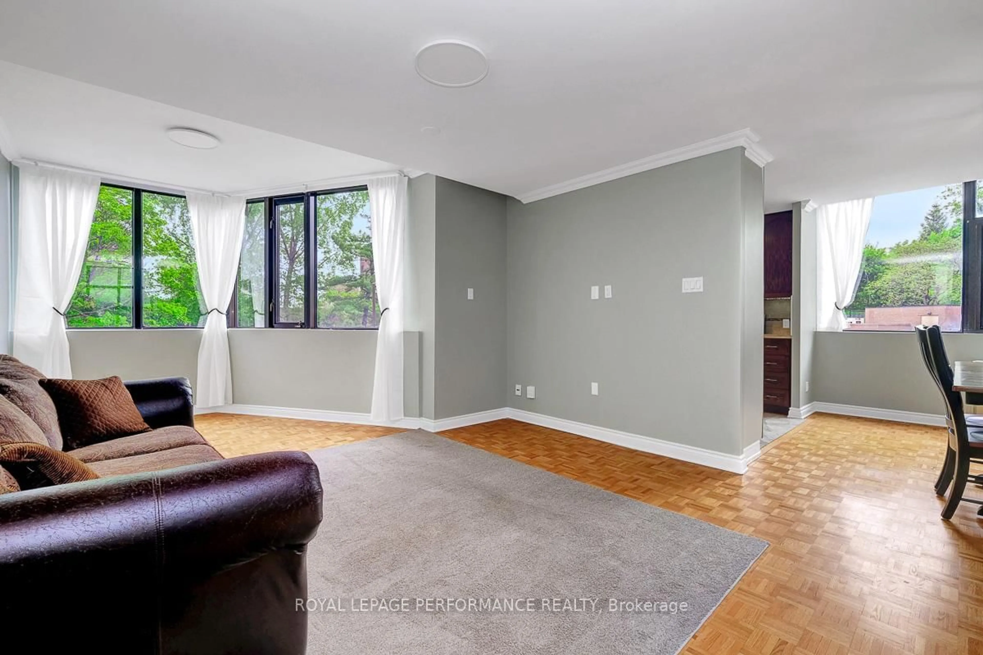 Living room with furniture, unknown for 2871 Richmond Rd #302, Ottawa Ontario K2B 8M5