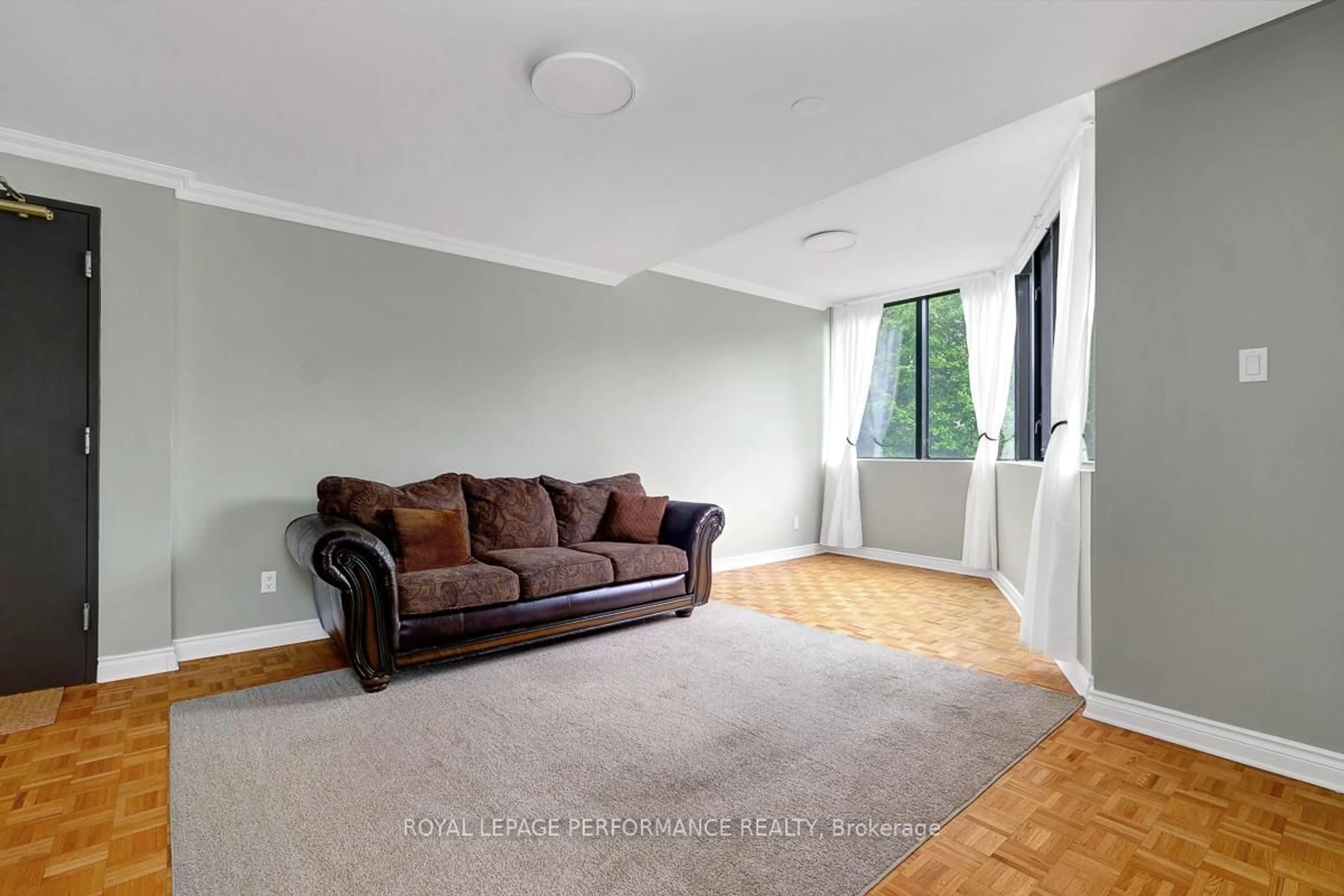 Living room with furniture, carpet floor for 2871 Richmond Rd #302, Ottawa Ontario K2B 8M5