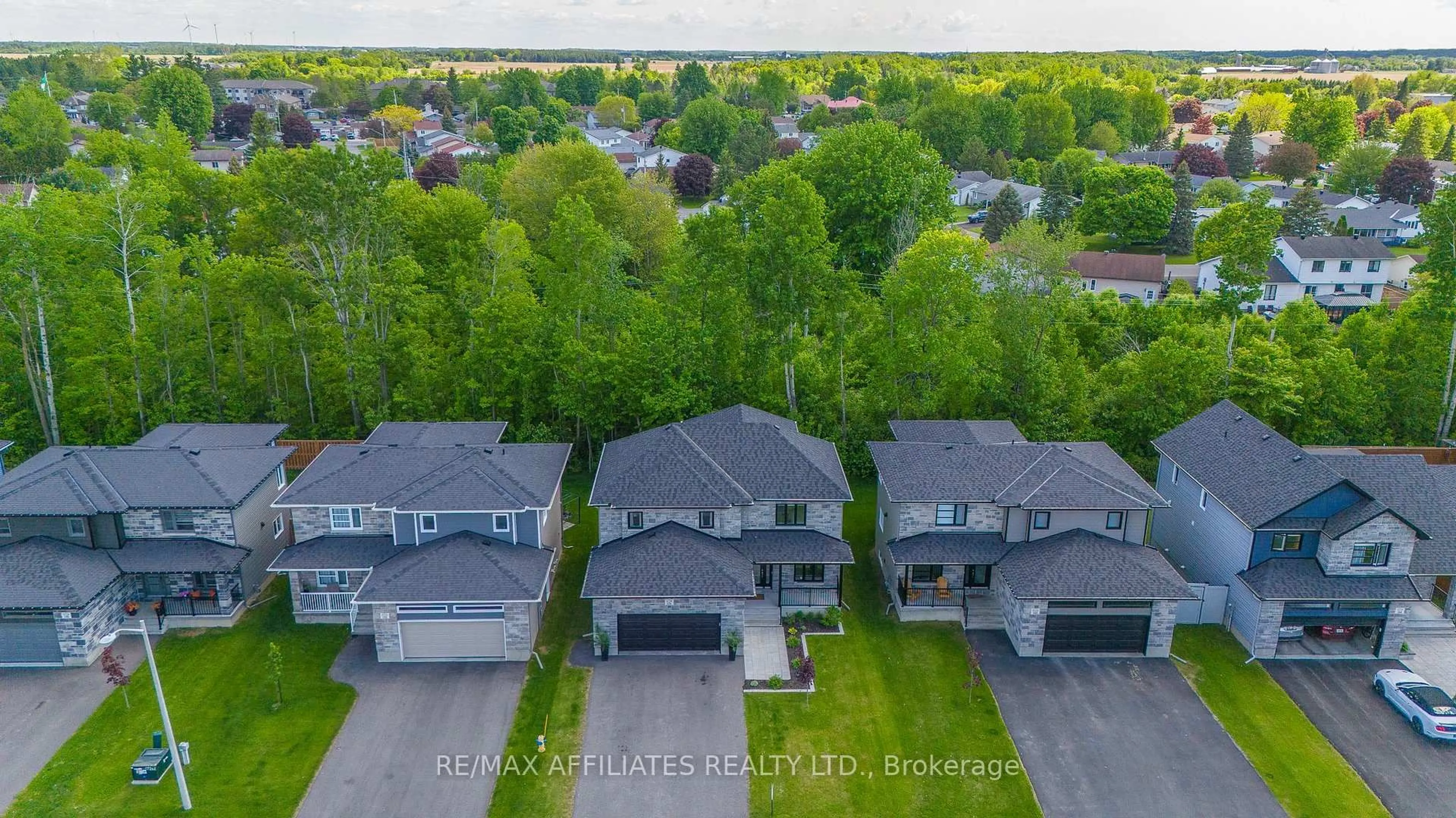 A pic from outside/outdoor area/front of a property/back of a property/a pic from drone, street for 156 Hybrid St, Russell Ontario K0A 1W0