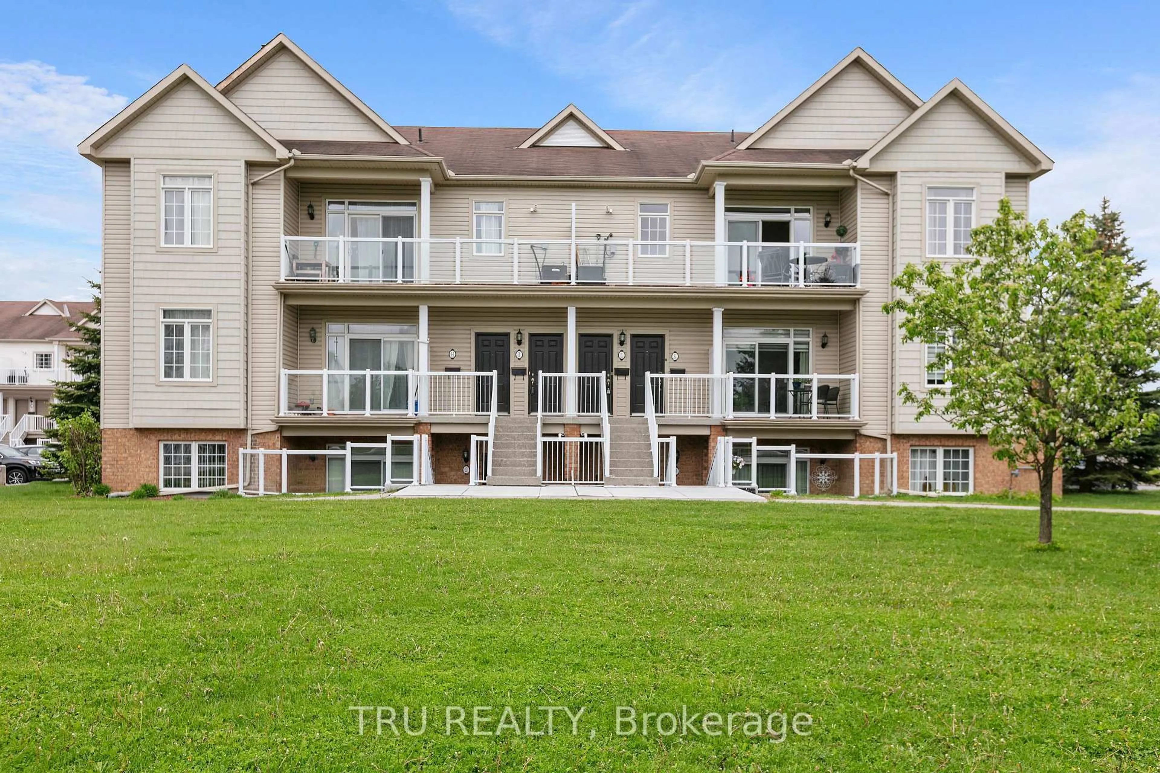 A pic from outside/outdoor area/front of a property/back of a property/a pic from drone, water/lake/river/ocean view for 107L Artesa Private, Ottawa Ontario K2S 0J8