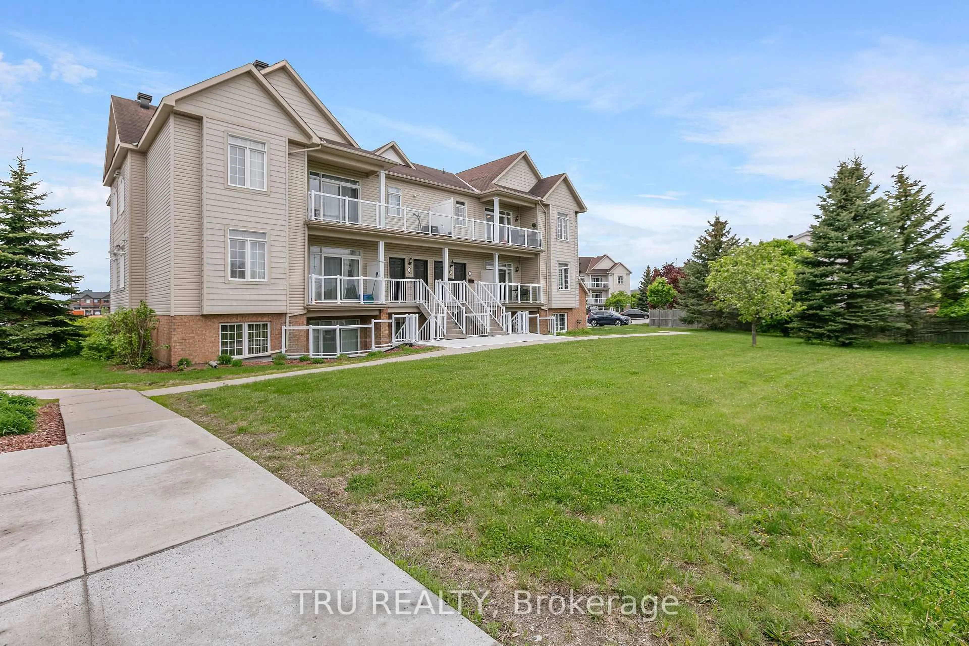 A pic from outside/outdoor area/front of a property/back of a property/a pic from drone, water/lake/river/ocean view for 107L Artesa Private, Ottawa Ontario K2S 0J8