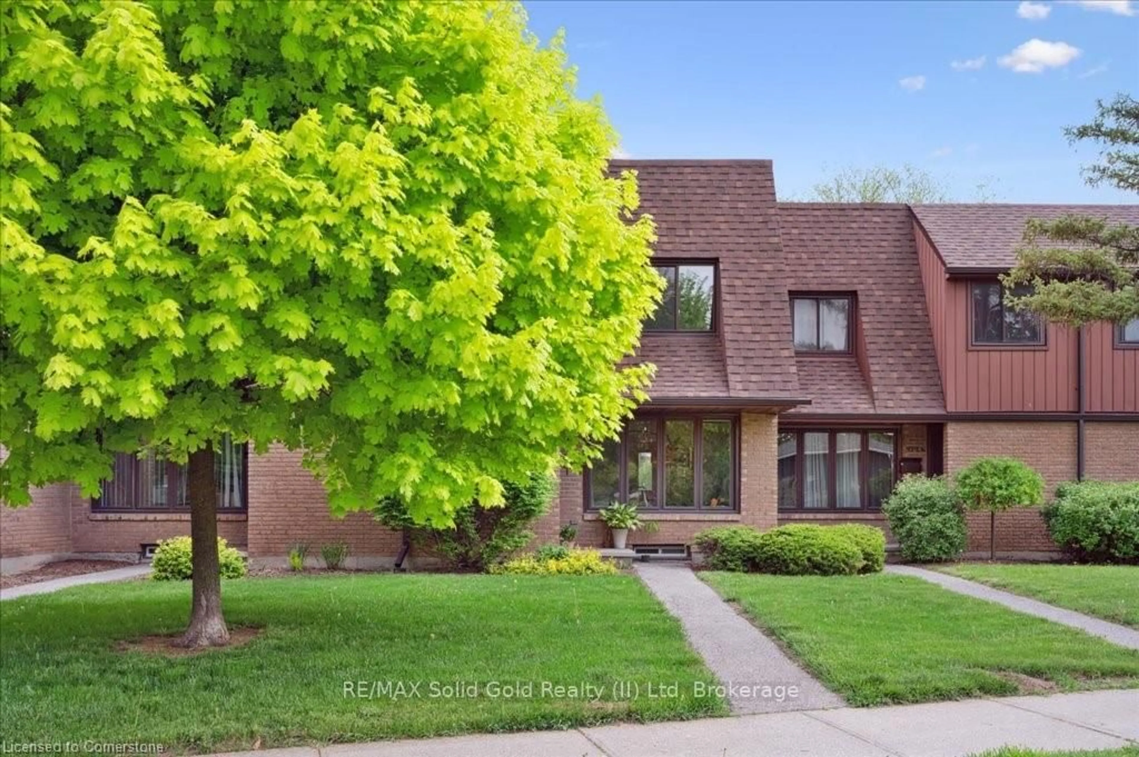 Home with brick exterior material, street for 104 Kingswood Dr, Kitchener Ontario N2E 1S9