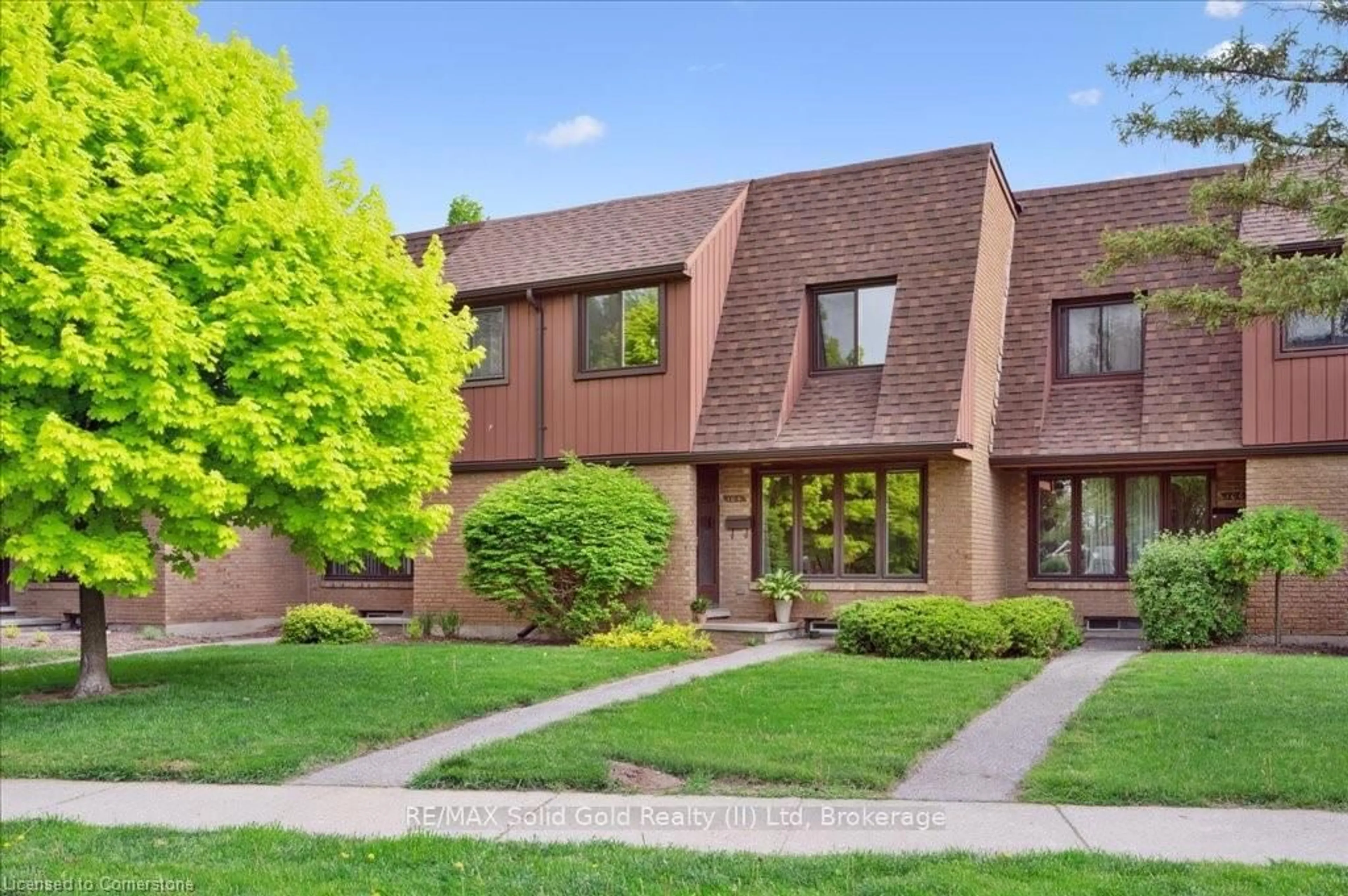 Home with brick exterior material, street for 104 Kingswood Dr, Kitchener Ontario N2E 1S9