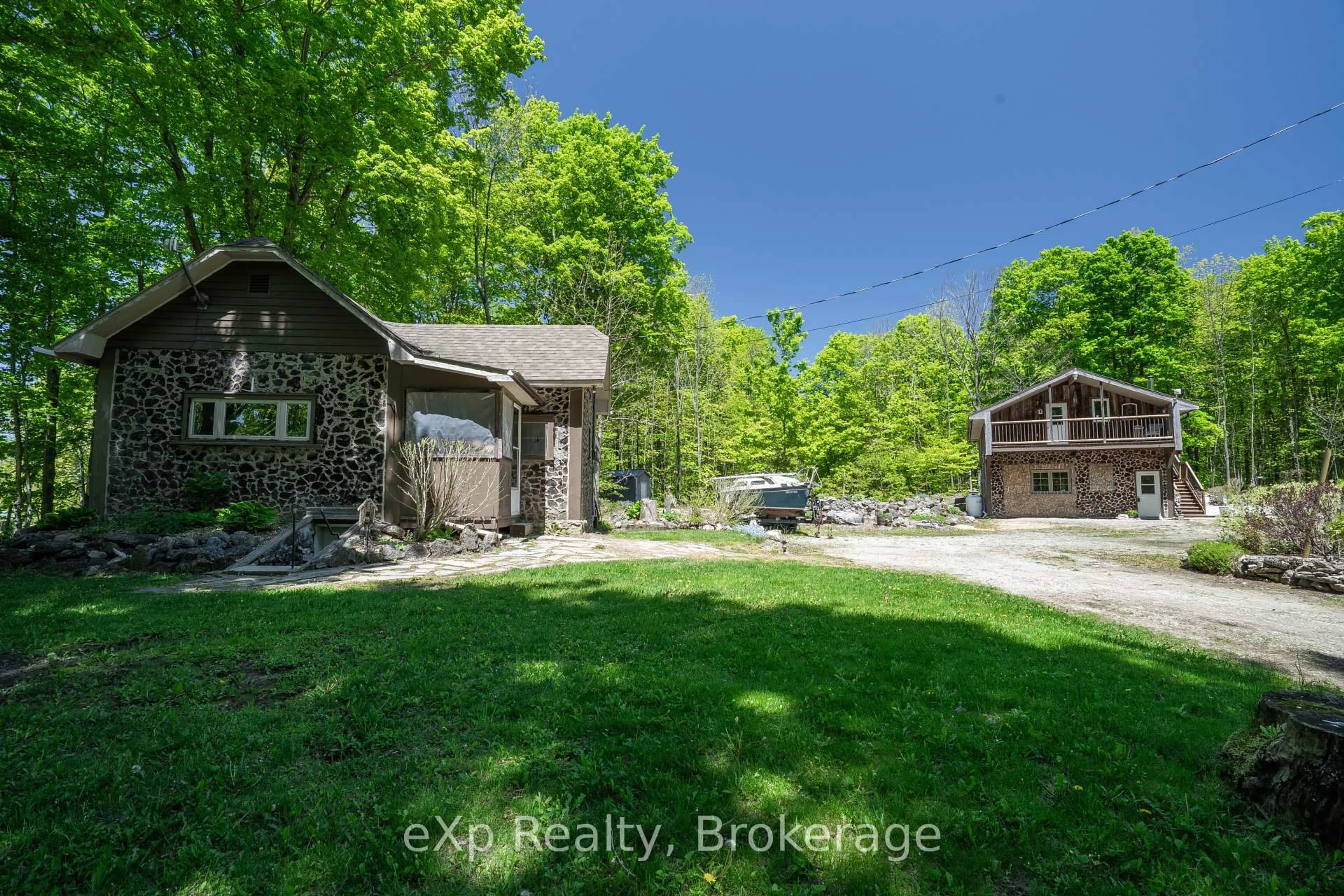 A pic from outside/outdoor area/front of a property/back of a property/a pic from drone, forest/trees view for 442183 Concession 21 Concession, Georgian Bluffs Ontario N0H 2T0